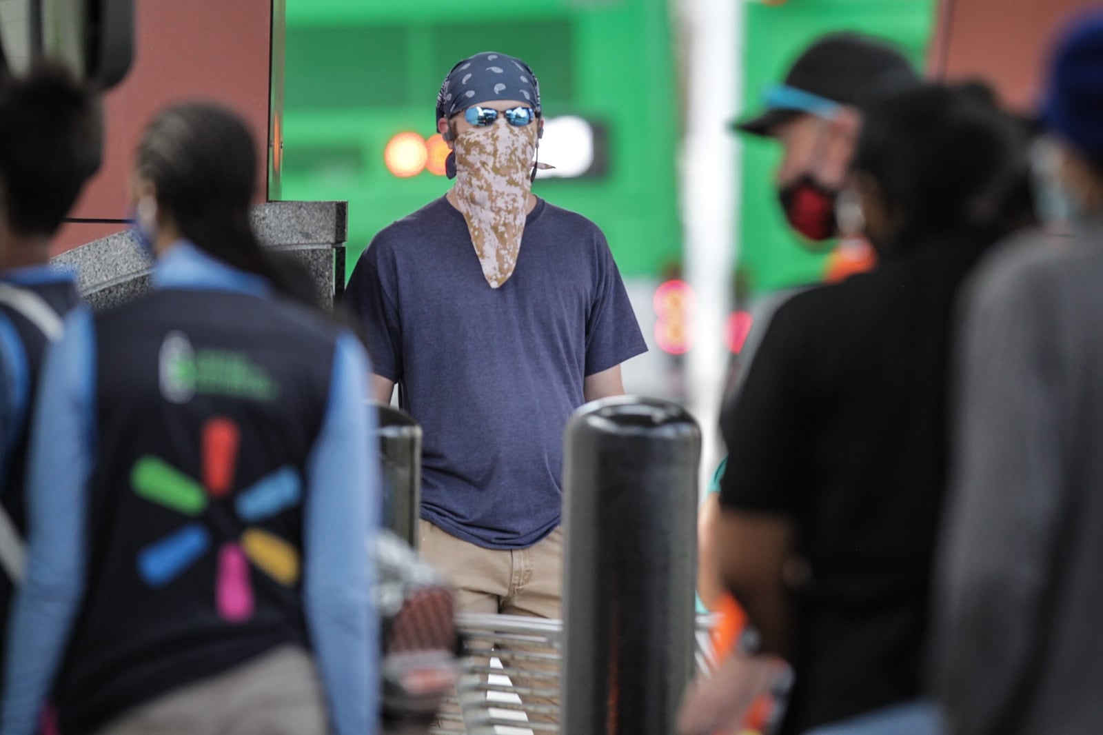 Andrew Foulke from Miamisburg waits on a bus at the RTA hub on Third St. in Dayton on Thursday afternoon, Aug. 13, 2020. Ridership for RTA has fluctuated since the COVID-19 outbreak in March, right now, ridership is down 40% from 2019. JIM NOEKLER/STAFF