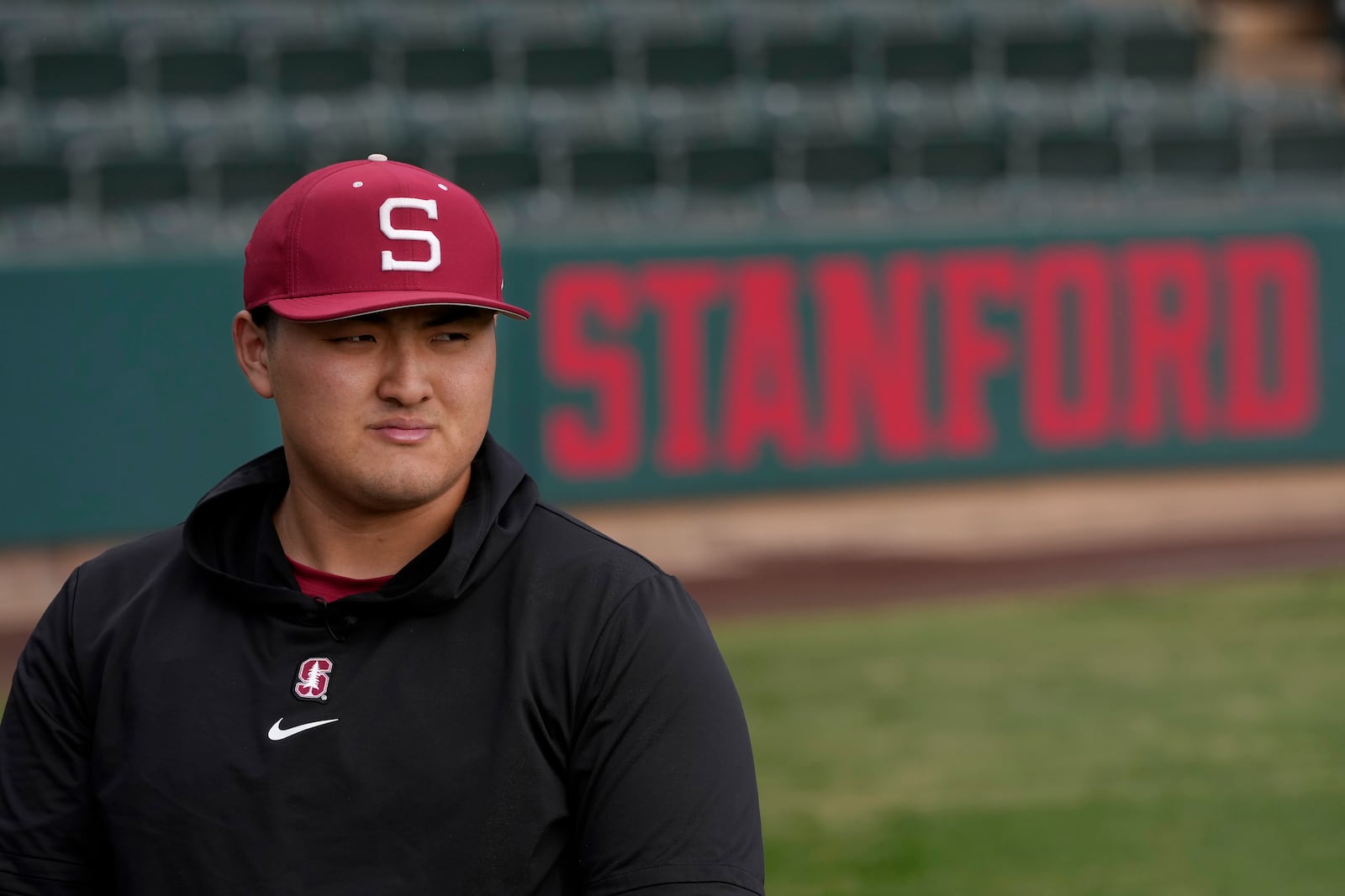 Stanford baseball player Rintaro Sasaki is interviewed at the Sunken Diamond baseball field at Stanford University in Stanford, Calif., Friday, Feb. 7, 2025. (AP Photo/Jeff Chiu)