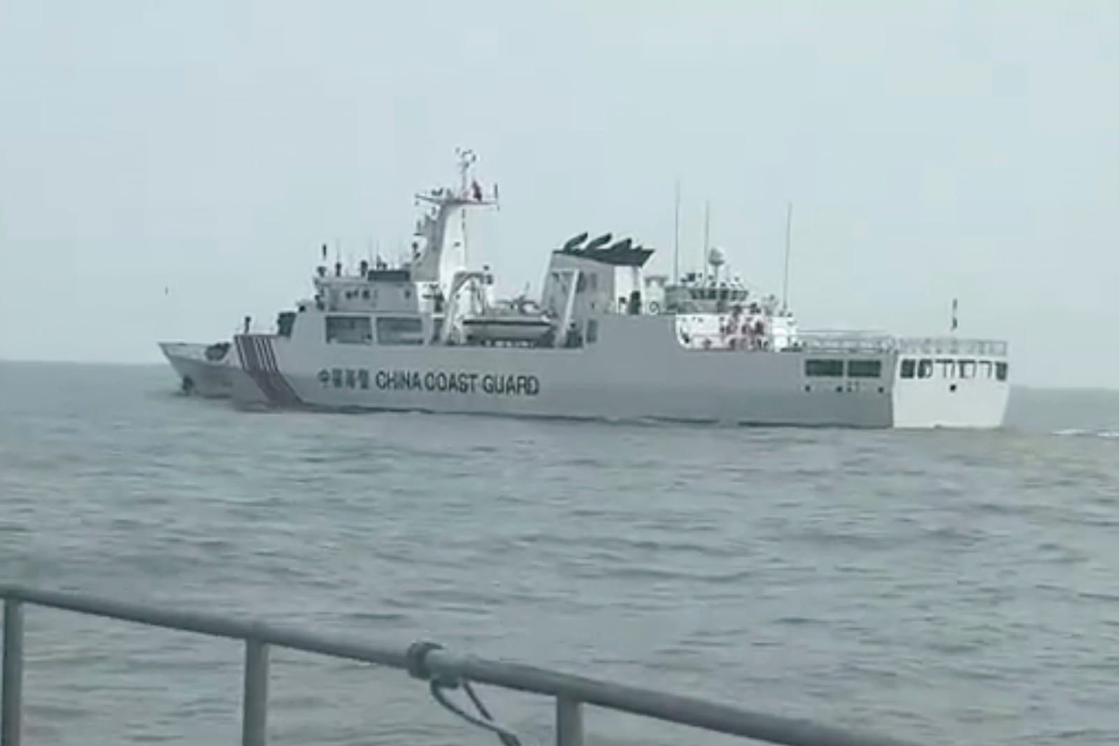 In this image taken off a video released by the Taiwan Coast Guard, a Chinese Coast Guard vessel enters the waters near Kinman Island, seen from a Taiwan Coast Guard vessel on Tuesday, Feb. 25, 2025. (Taiwan Coast Guard via AP)