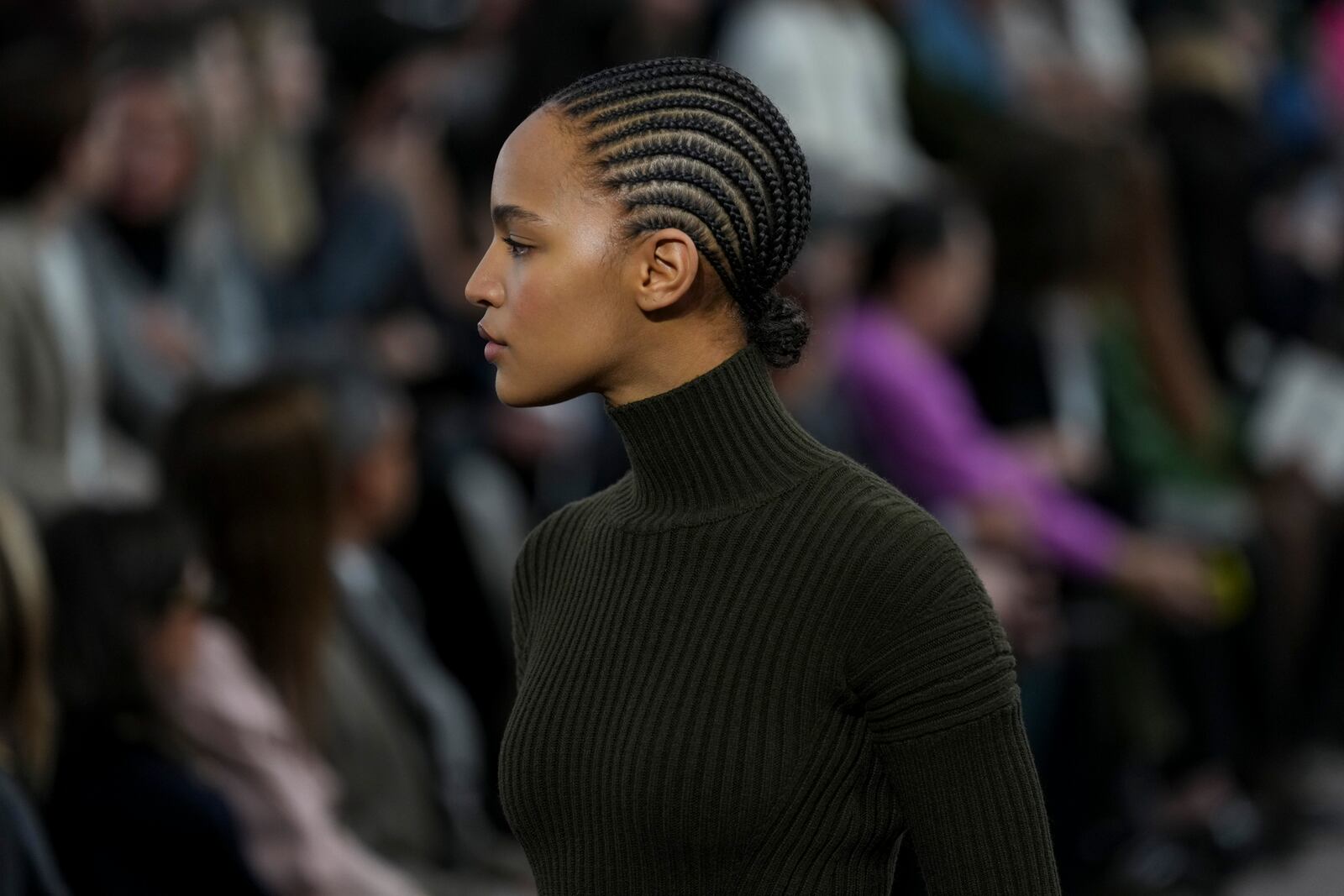 A model wears a creation as part of the Max Mara Fall/Winter 2025-2026 Womenswear collection presented in Milan, Italy, Thursday, Feb. 27, 2025. (AP Photo/Antonio Calanni)