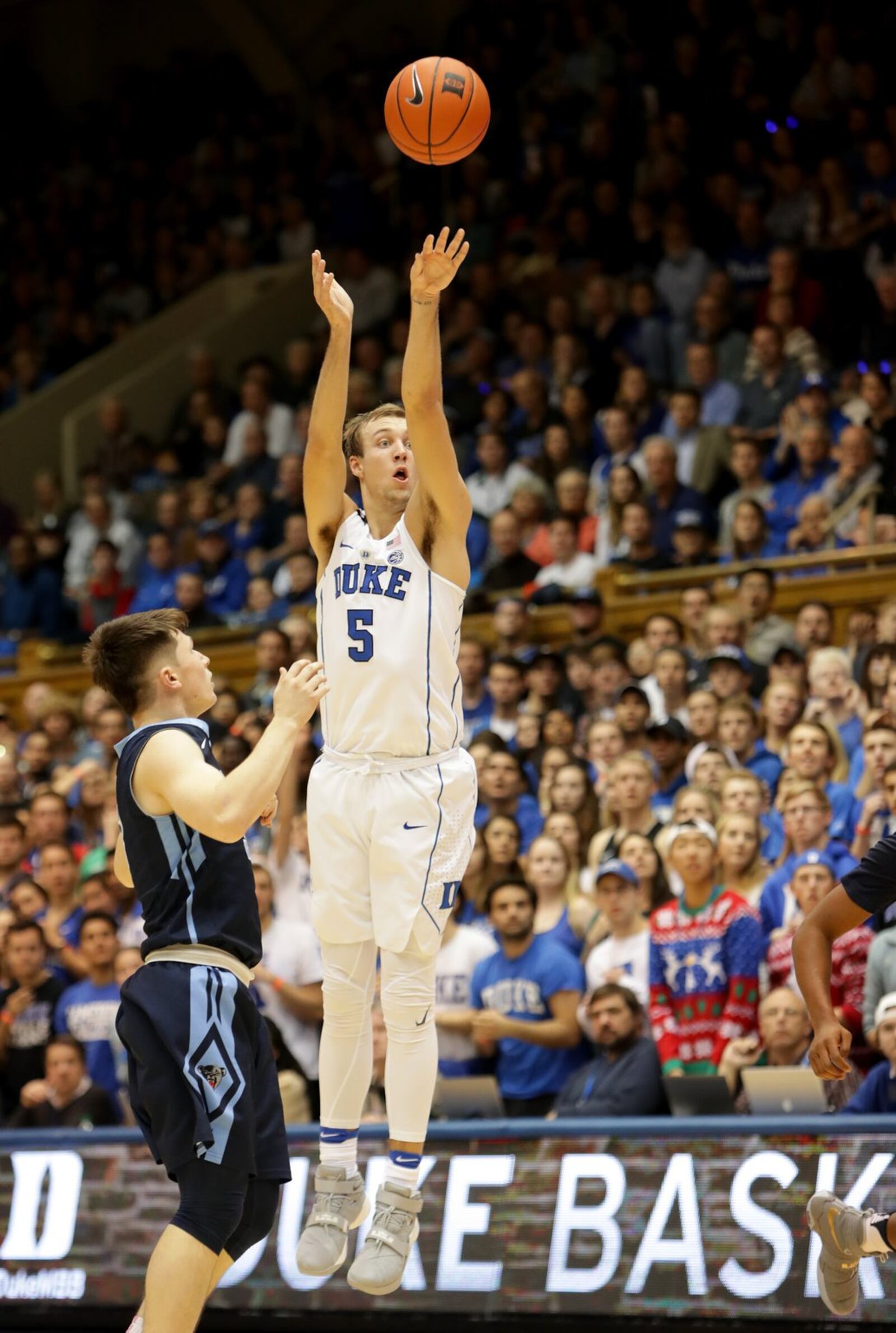 Duke’s Luke Kennard (5) shoots over Ryan Bernstein (3) of Maine during a game at Cameron Indoor Stadium in Durham, N.C., on Dec. 3. STREETER LECKA/GETTY IMAGES