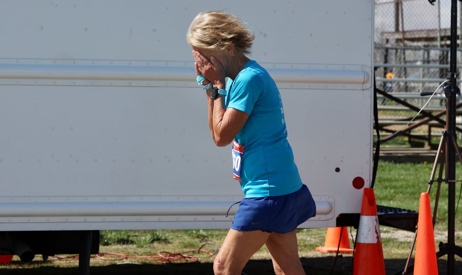 Mary Jablonski reacts after finishing the London Marathon on April 15, 2023, in London, Ohio. David Jablonski/Staff