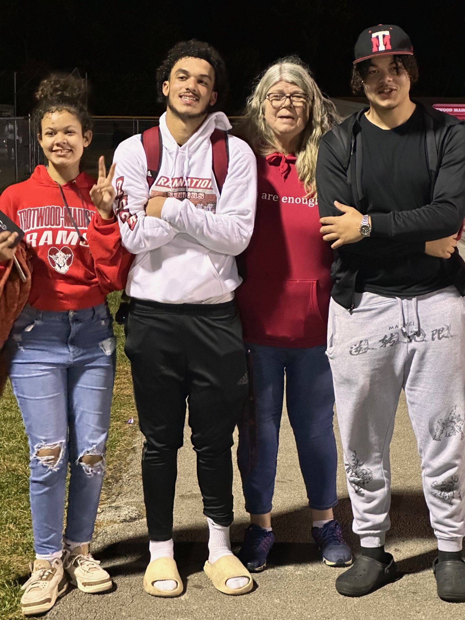 Issiah Evans (white sweatshirt) is flanked by his younger sister, Denise; his grandma Vickie Nelson and his twin brother, Garfield. CONTRIBUTED