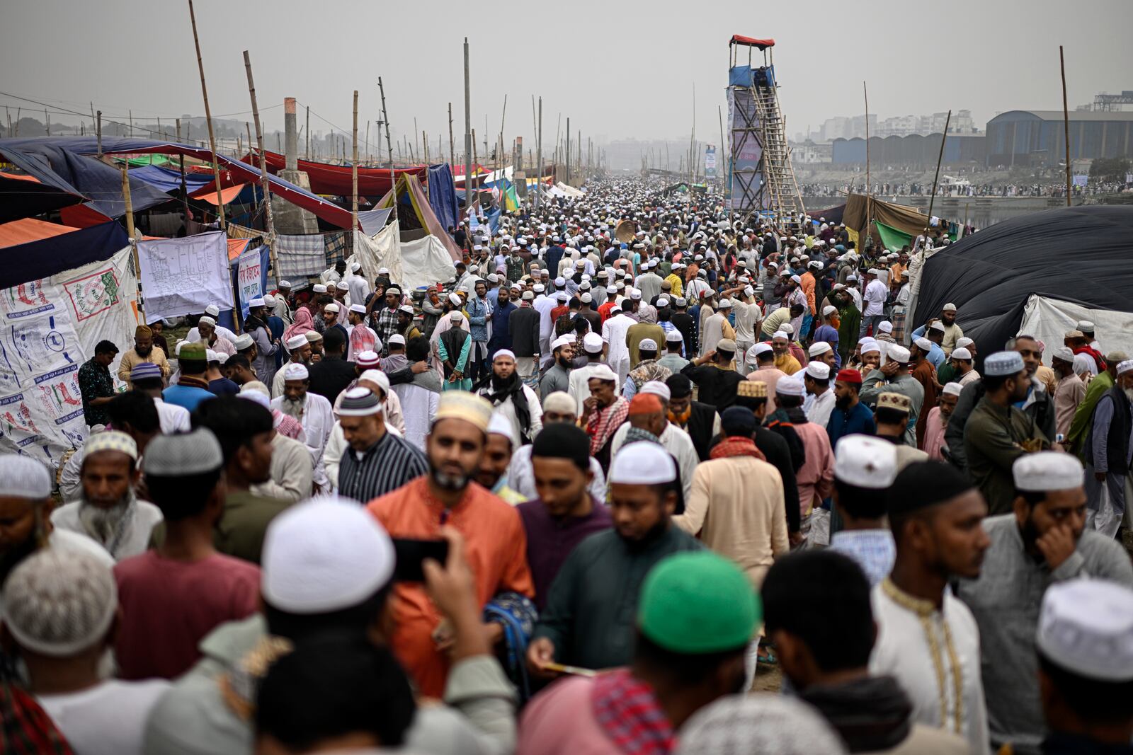 Muslim devotees gather during the first phase of the three-day Biswa Ijtema, or the World Congregation of Muslims, at the banks of the Turag river in Tongi, near Dhaka, Bangladesh, Friday, Jan. 31, 2025. (AP Photo/Mahmud Hossain Opu)