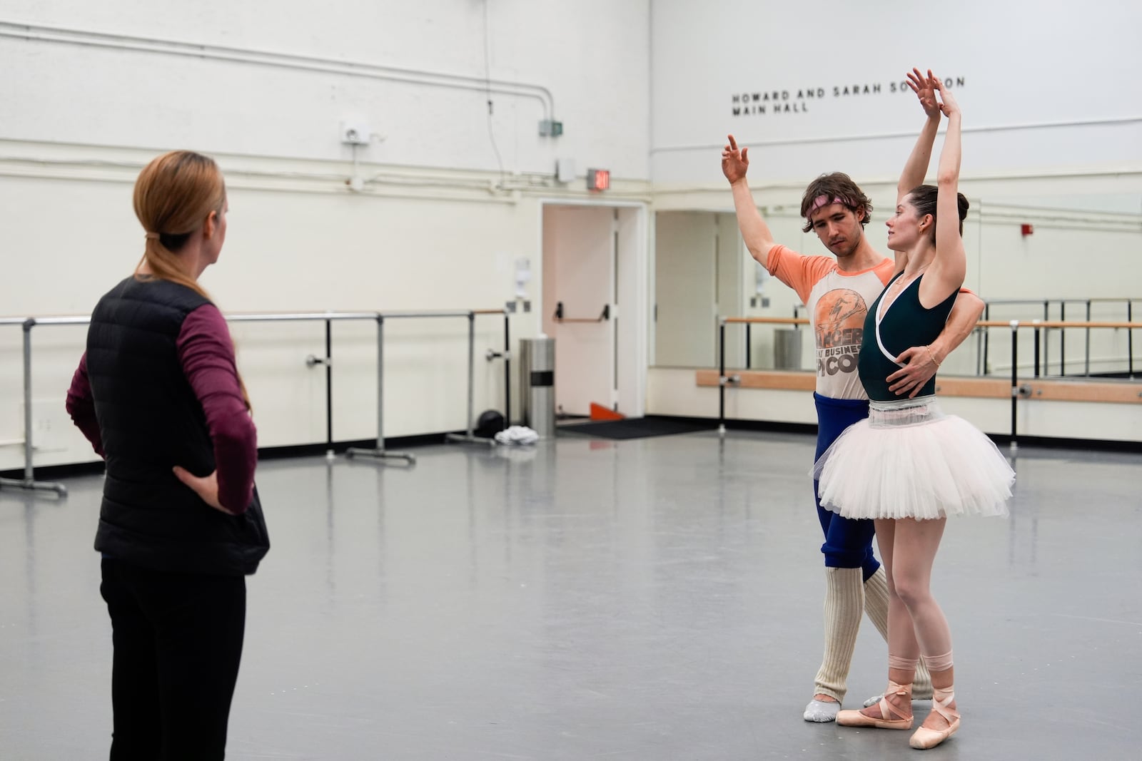 Repertory Director Kathleen Tracey, left, watches Joseph Gordon and Unity Phelan, right, rehearse for New York City Ballet's "Swan Lake," Tuesday, Feb. 25, 2025, in New York. (AP Photo/Julia Demaree Nikhinson)