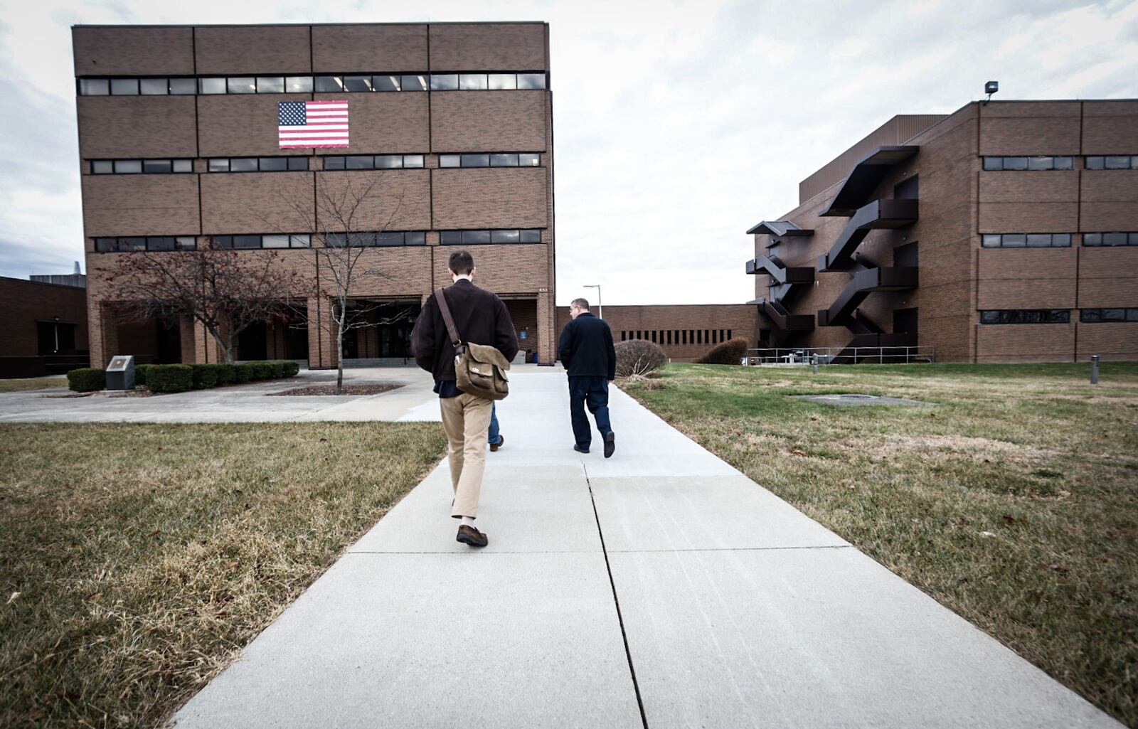 Workers walking into an AFRL Testing Lab at Wright-Patterson Air Force Base. JIM NOELKER/STAFF