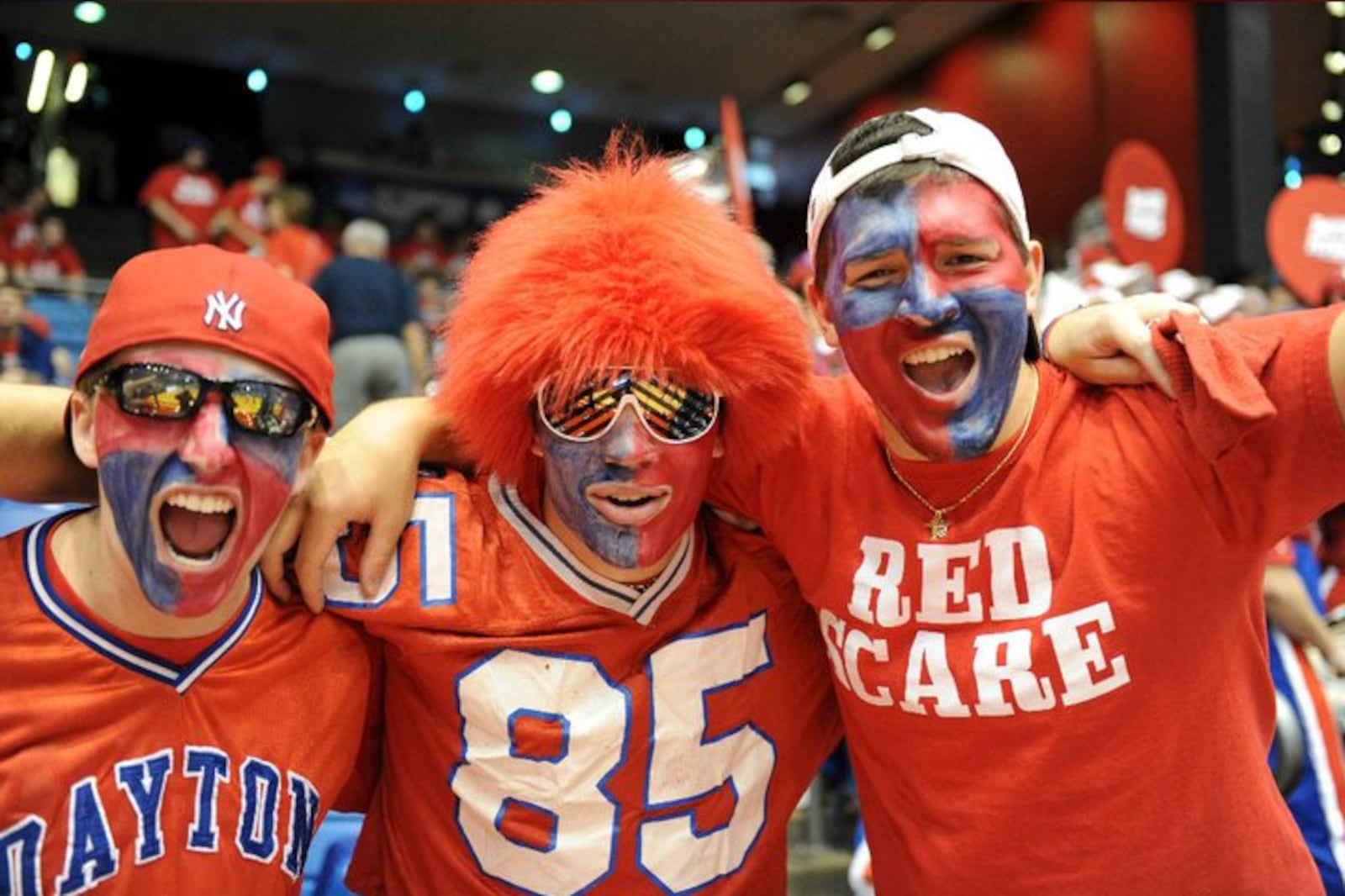 Dan Sullivan, center, poses for a photo at UD Arena during his college days with Justin Harenchar, left, and Dan Perchinsky.