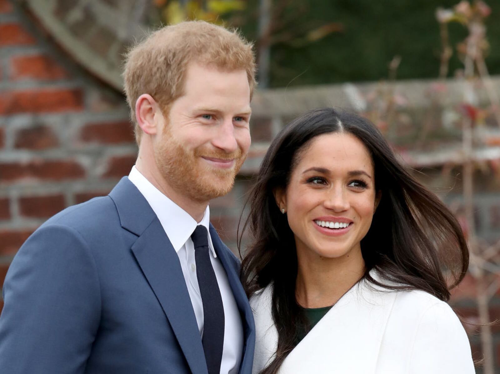 LONDON, ENGLAND - NOVEMBER 27:  Prince Harry and actress Meghan Markle during an official photocall to announce their engagement at The Sunken Gardens at Kensington Palace on November 27, 2017 in London, England.  Prince Harry and Meghan Markle have been a couple officially since November 2016 and are due to marry in Spring 2018.  (Photo by Chris Jackson/Chris Jackson/Getty Images)