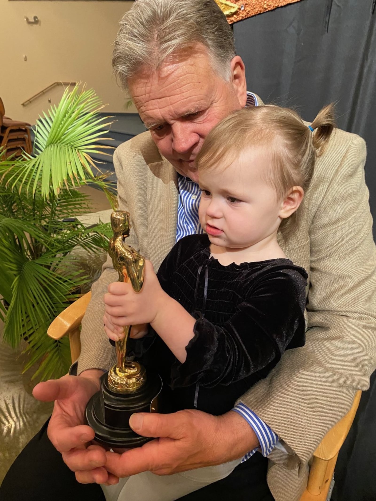 Ken Kettering with his granddaughter Kinley at Legacy Christian in Xenia for "Fiddler on the Roof" on April 22. CONTRIBUTED