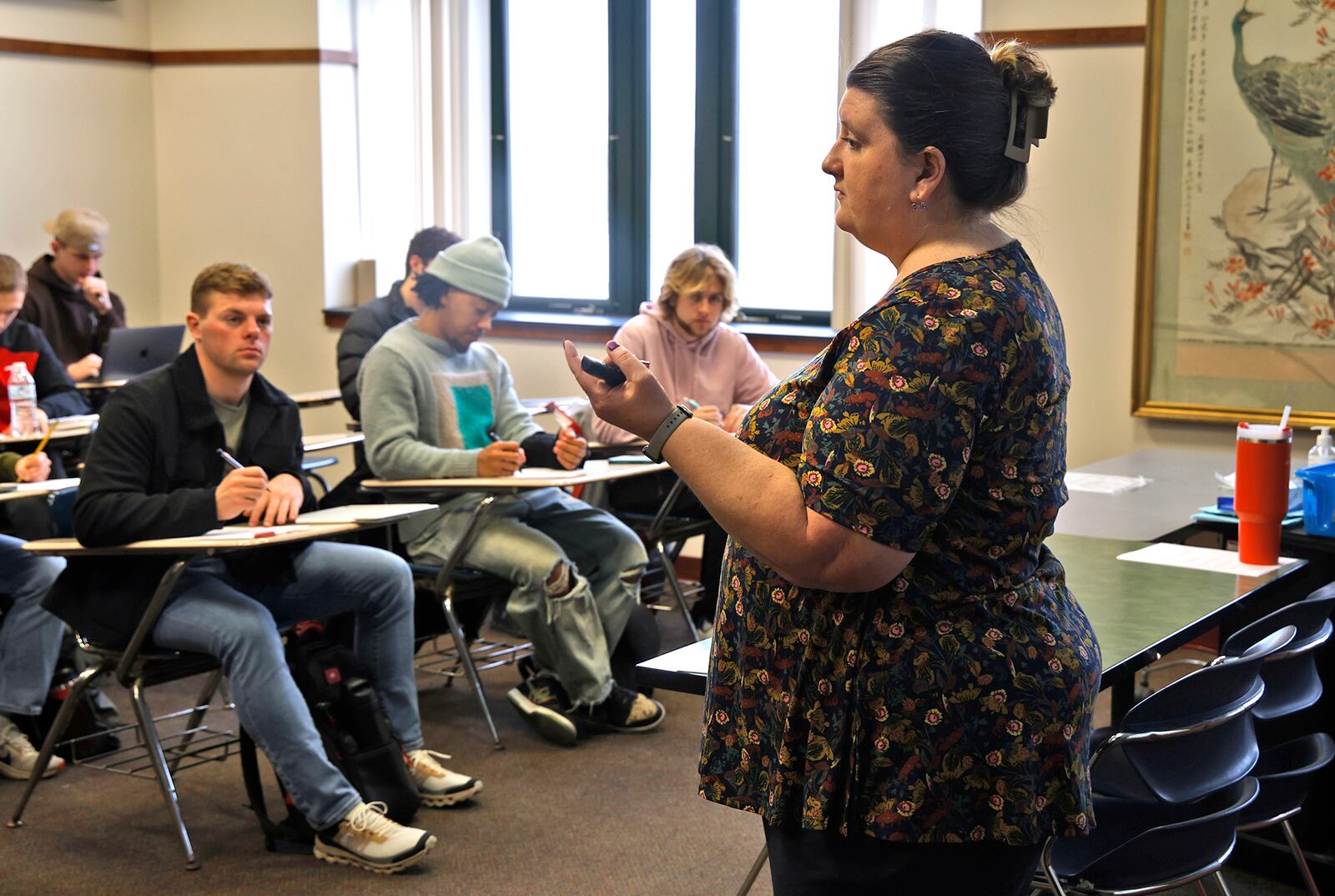 Kelly Dillon, associate professor of communications and digital media, teaches her media literacy class at Wittenberg University Friday, Feb. 16, 2024. BILL LACKEY/STAFF