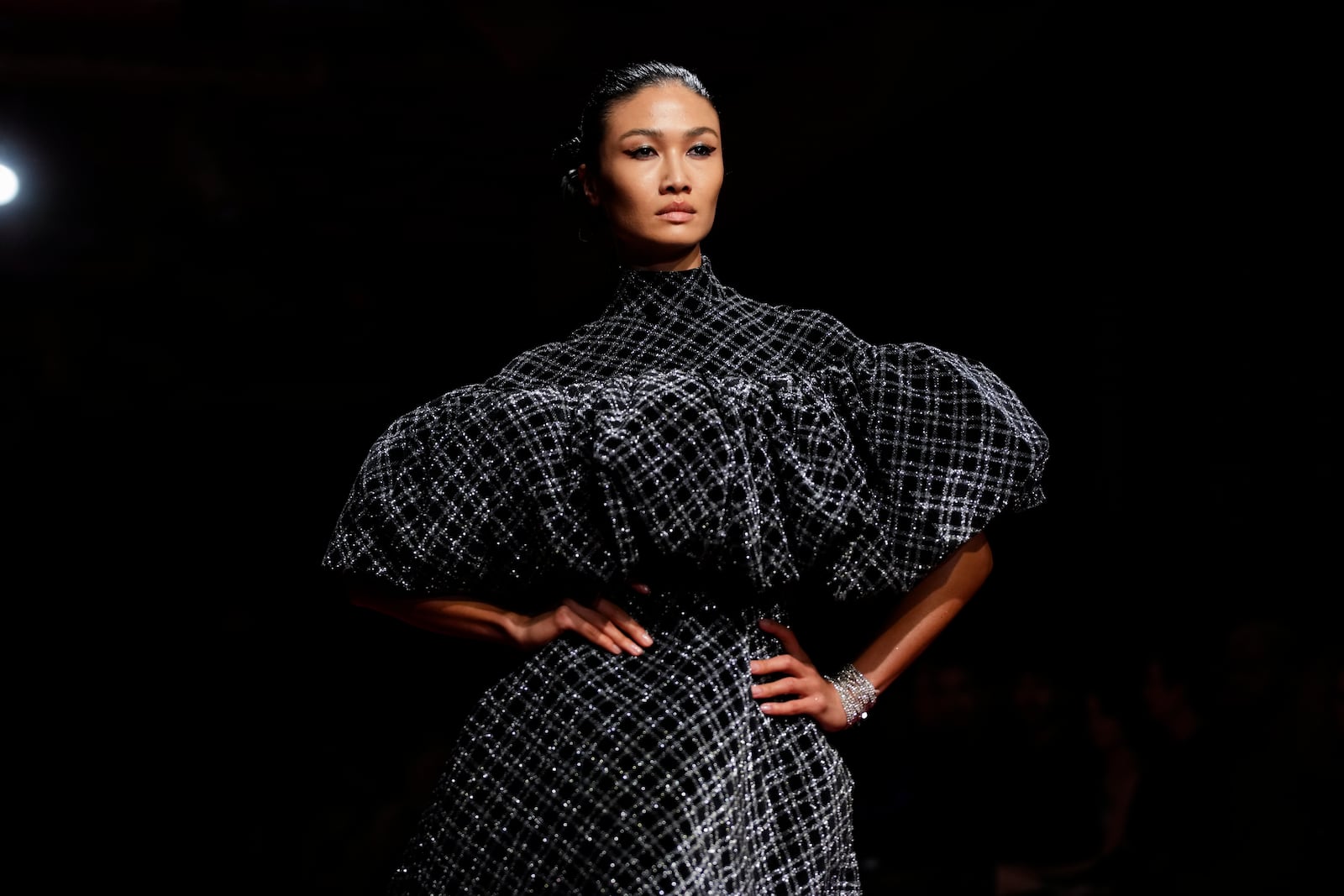 A model walks the runway during the Christian Siriano Fall/Winter 2025 fashion show at Chelsea Industrial during New York Fashion Week on Thursday, Feb. 6, 2025, in New York. (Photo by Charles Sykes/Invision/AP)