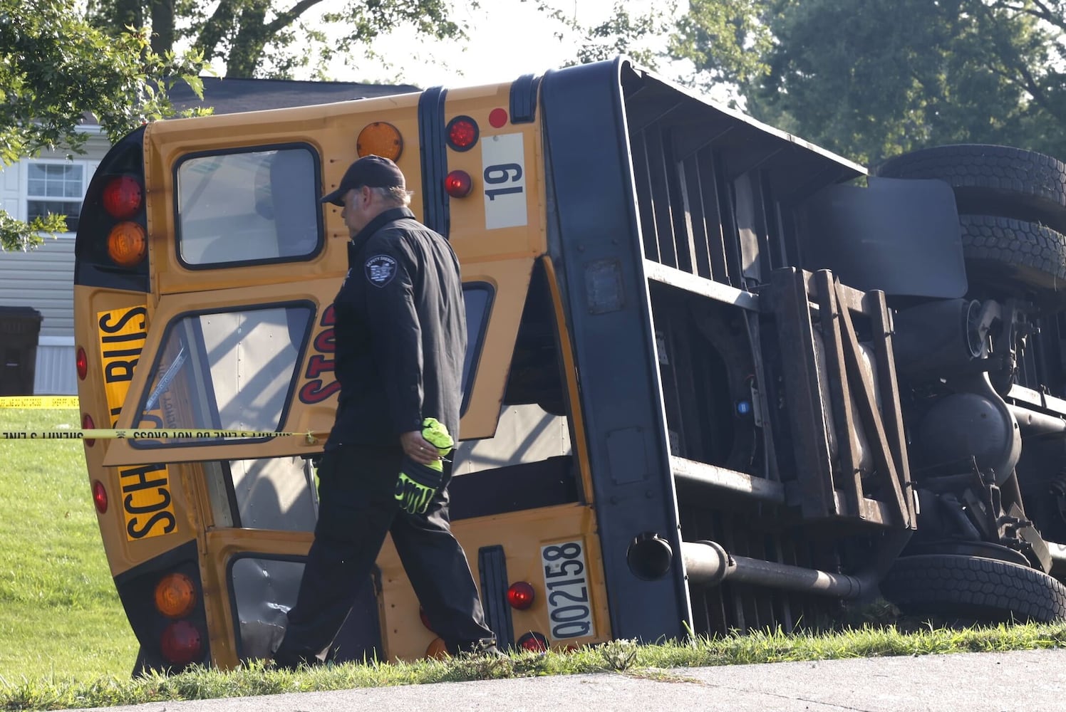 One killed after Northwestern school bus overturns in crash