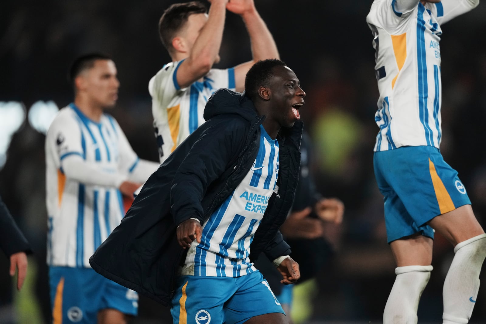 Brighton's Yankuba Minteh celebratees after the English Premier League soccer match between Brighton and Chelsea in Brighton, England, Friday, Feb. 14, 2025. (AP Photo/Dave Shopland)