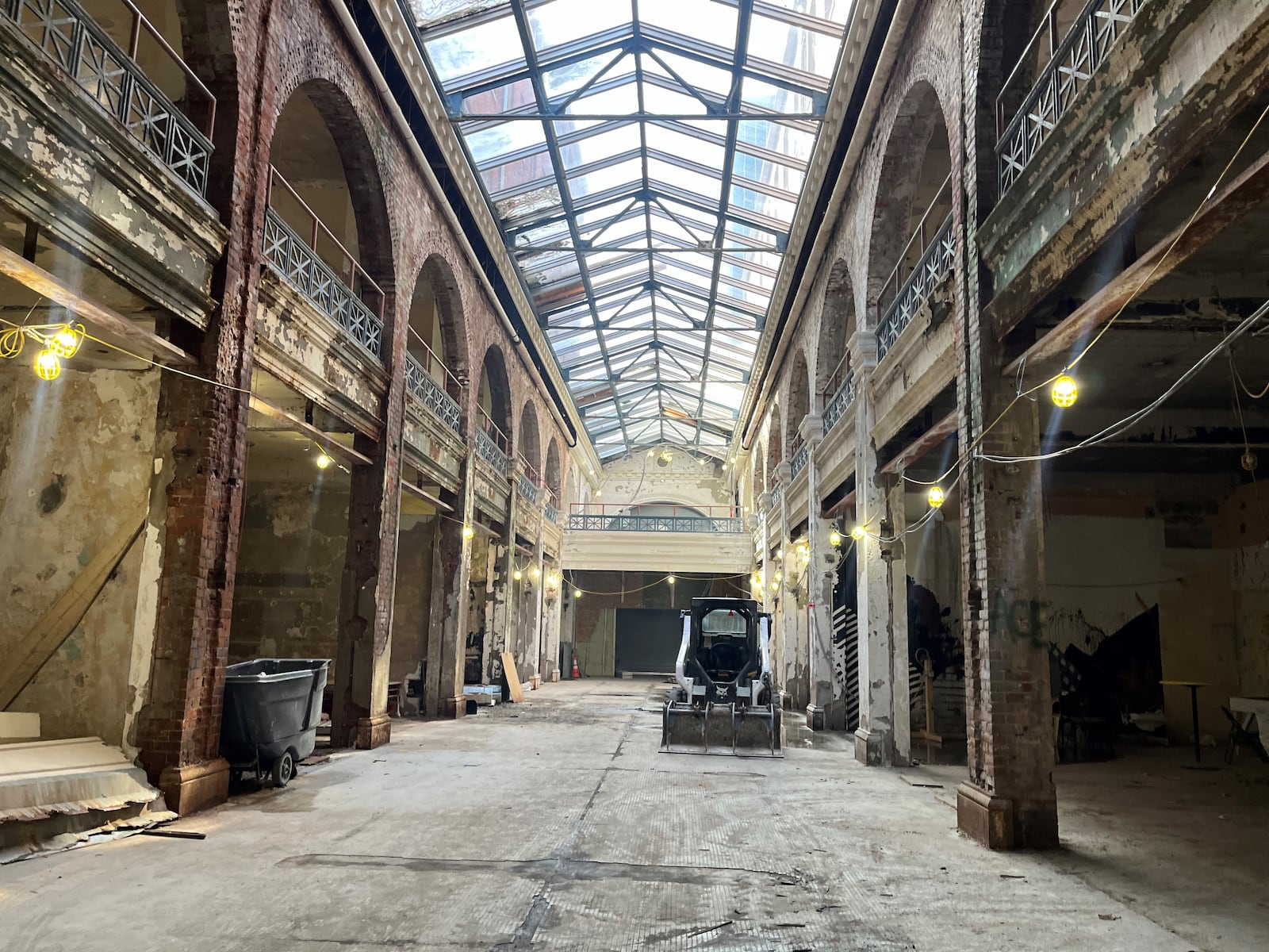 Work is underway on the Third Street arcade building in the Dayton Arcade. The building is being turned into a retail hub and a new hotel. CORNELIUS FROLIK / STAFF