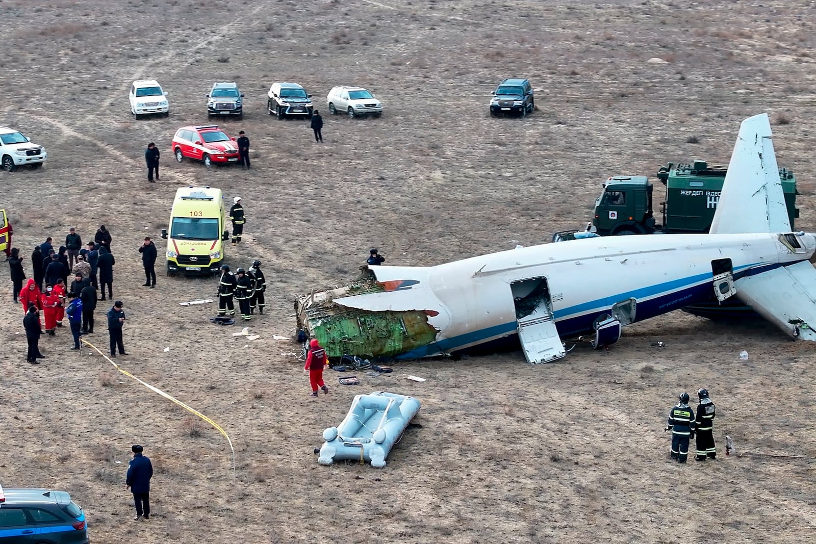 The wreckage of Azerbaijan Airlines Embraer 190 lays on the ground near the airport of Aktau, Kazakhstan, Wednesday, Dec. 25, 2024. (AP Photo/Azamat Sarsenbayev)