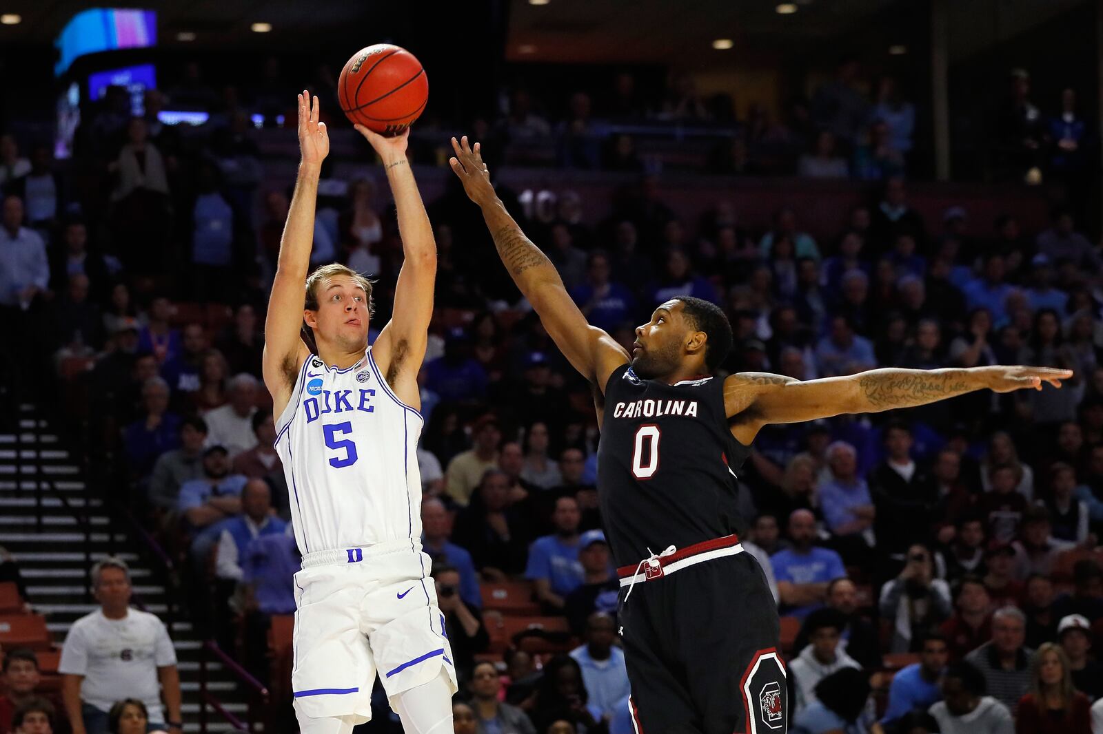 GREENVILLE, SC - MARCH 19: Luke Kennard #5 of the Duke Blue Devils shoots the ball against Sindarius Thornwell #0 of the South Carolina Gamecocks in the first half during the second round of the 2017 NCAA Men's Basketball Tournament at Bon Secours Wellness Arena on March 19, 2017 in Greenville, South Carolina. (Photo by Kevin C. Cox/Getty Images)