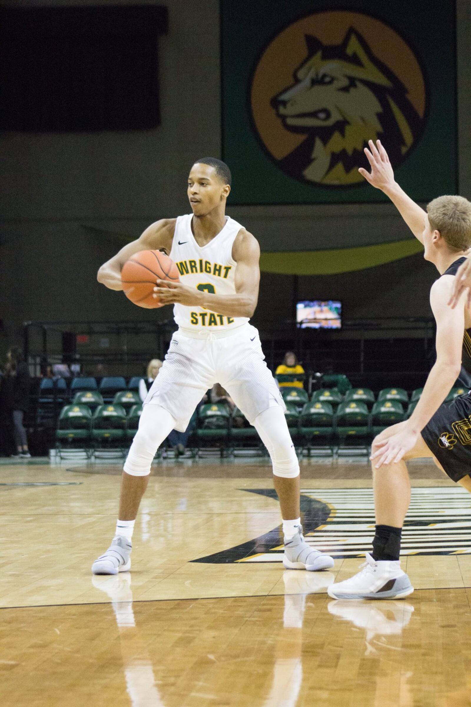 Wright State freshman Jaylon Hall looks to pass during the Raiders’ exhibition game Nov. 3 vs. Wayne State. Allison Rodriguez/CONTRIBUTED