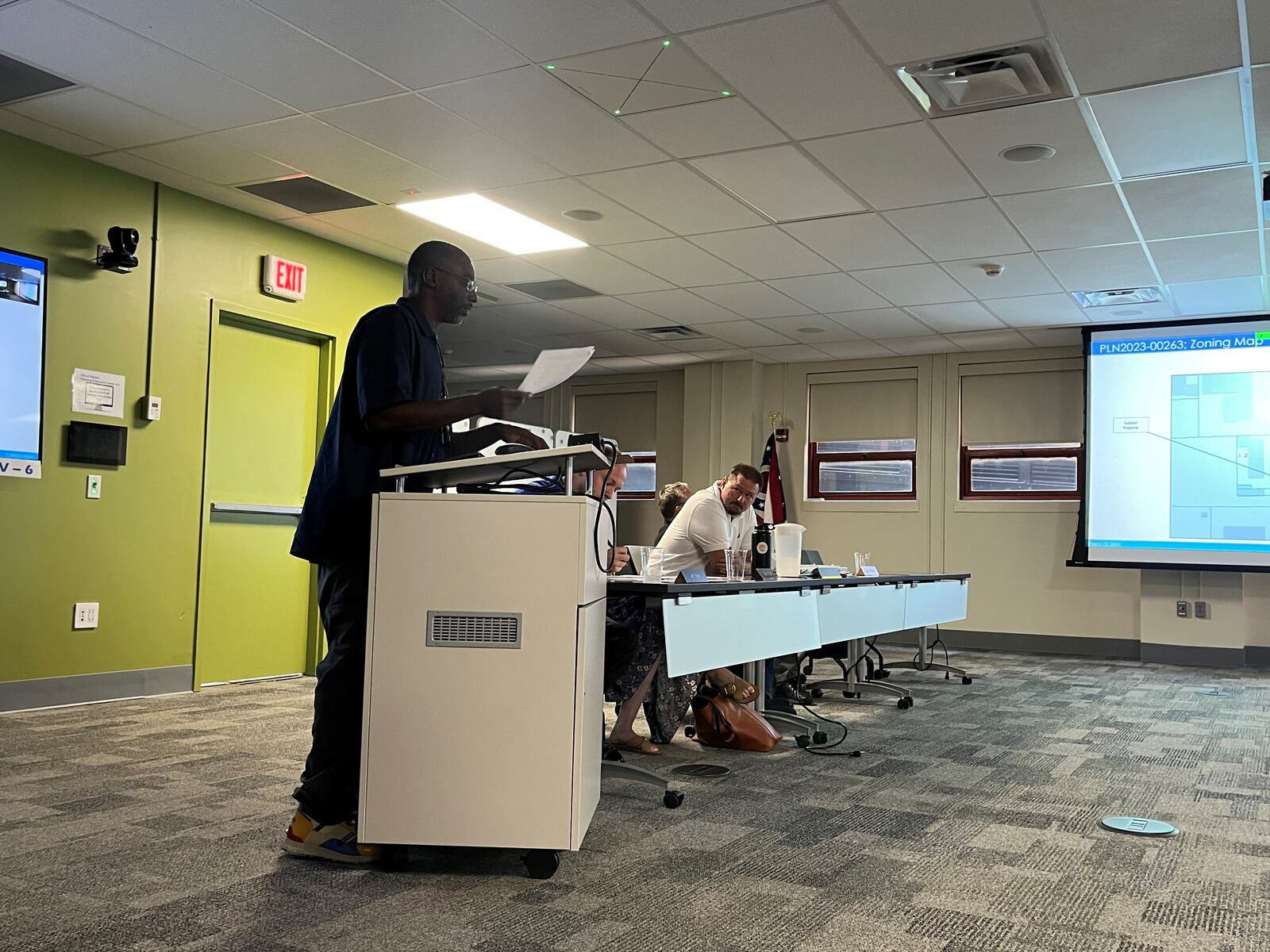 DeQuan Heard, the owner of Sugar Daddy’s Auto Sales, speaks at a Dayton Board of Zoning Appeals meeting on Tuesday, Aug. 23, 2023. CORNELIUS FROLIK / STAFF