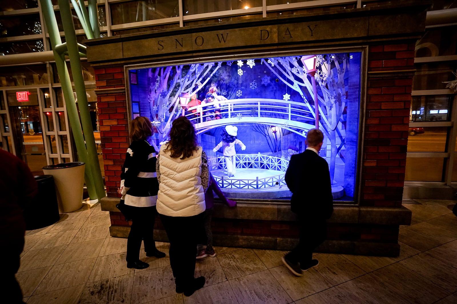 "Snow Day", one of the 2019 new reveals as part of Rike's Holiday Windows. Designed by critically acclaimed theatre and opera scenic designer and Dayton native Adam Koch, along with partner Steven Royal, the windows featuring animated elves, animals and other figures have been a holiday tradition for countless Dayton families since the elves first appeared in the windows of Rike’s Department Store in the 1940's.