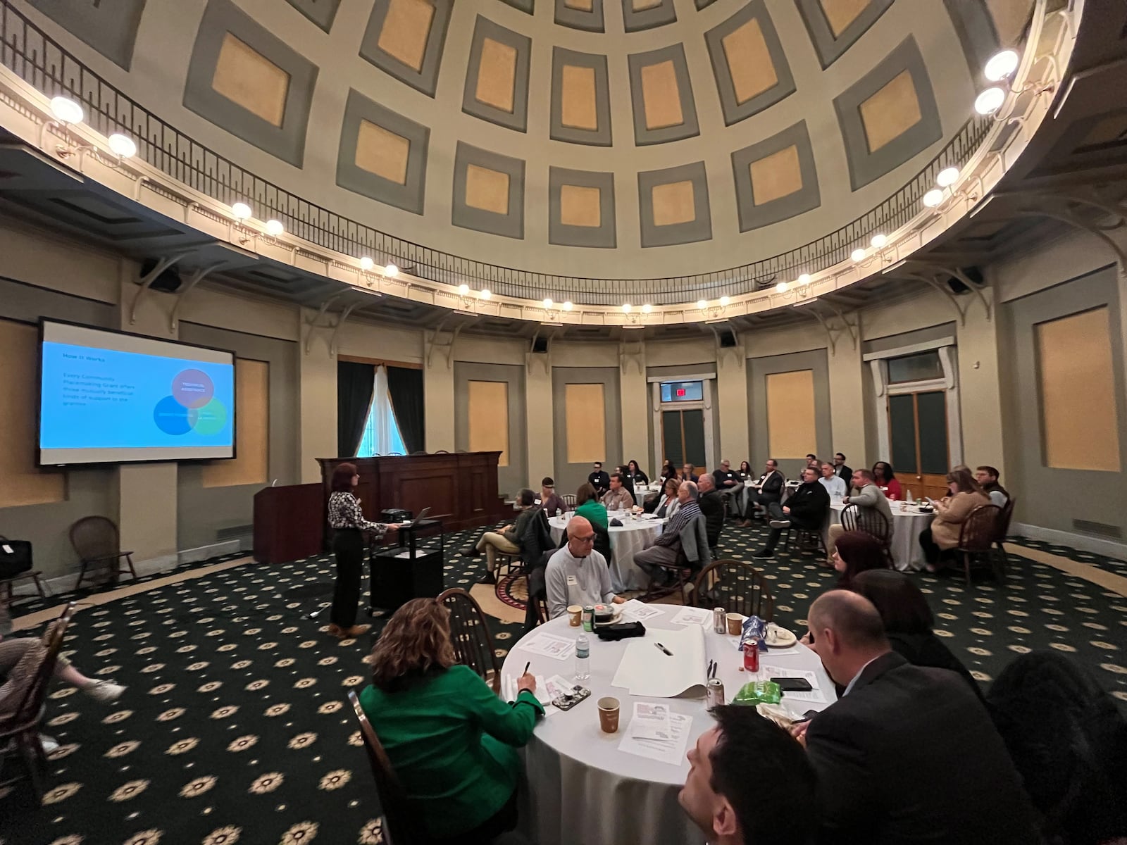 Community leaders and members discuss potential improvements to Courthouse Square at the historic courthouse on Tuesday, April 25, 2023. CORNELIUS FROLIK / STAFF