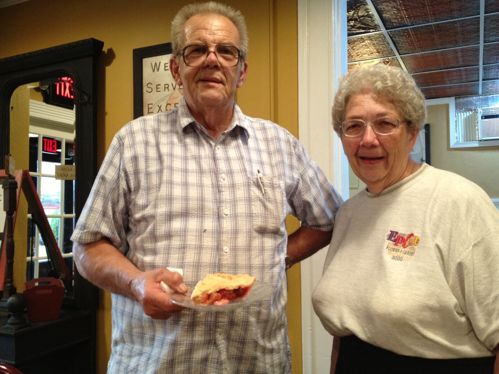 Bob Bianco shows off a piece of his homemade strawberry rhubarb pie. He and his wife, Beth, have operated the Pearson House Restaurant in West Milton for the past 30 years.