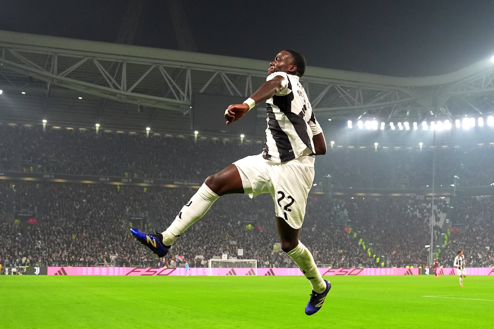 Juventus' Timothy Weah celebrates after scoring their side's first goal of the game during the Serie A soccer match between Juventus and Torino at Allianz Stadium in Turin, Italy, Saturday, Nov. 9 , 2024. (Spada/LaPresse via AP)