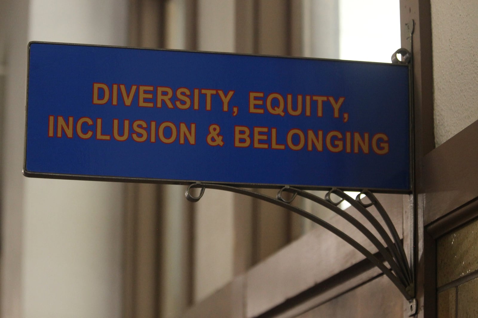 FILE - The sign above the door to the Office of Diversity, Equity, Inclusion and Belonging inside the main administration building on the main University of Kansas campus is seen on Friday, April 12, 2024, in Lawrence, Kan. (AP Photo/John Hanna, File)