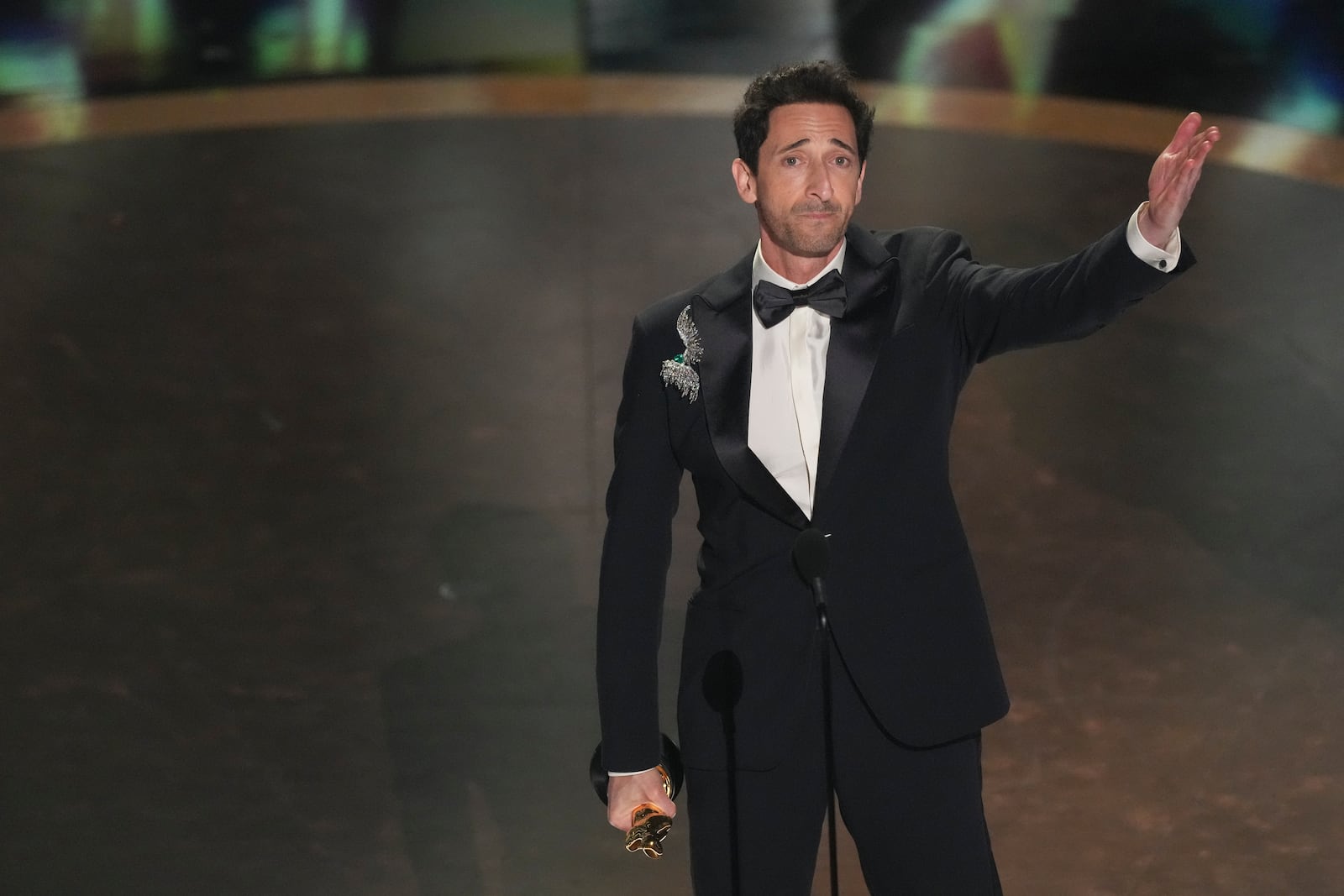 Adrien Brody accepts the award for best performance by an actor in a leading role for "The Brutalist" during the Oscars on Sunday, March 2, 2025, at the Dolby Theatre in Los Angeles. (AP Photo/Chris Pizzello)