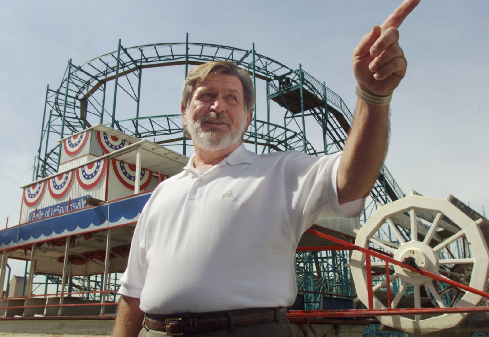 RV dealer Jerry Couch purchased Americana Amusement Park in 2000. He is pictured here with the Belle of LeSourdsville and the Serpent.