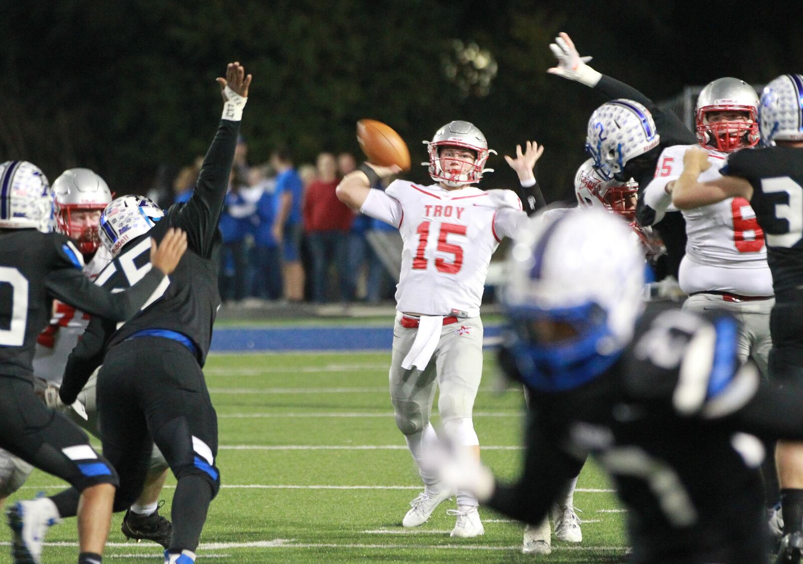 Troy QB Brayden Siler delivers a pass. Xenia defeated visiting Troy 24-22 in a Week 9 high school football game on Friday, Oct. 25, 2019. MARC PENDLETON / STAFF