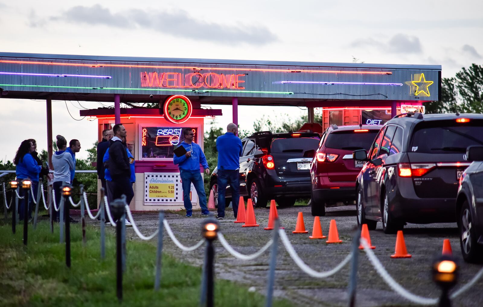 Hamilton High School graduates celebrated their commencement by viewing a pre-taped graduation ceremony at Holiday Auto Theatre drive-in Wednesday evening, May 20, 2020. Many schools have had to come up with uniuque ways to celebrate graduation while still adhering to social distancing guidelines during the coronavirus pandemic. NICK GRAHAM / STAFF