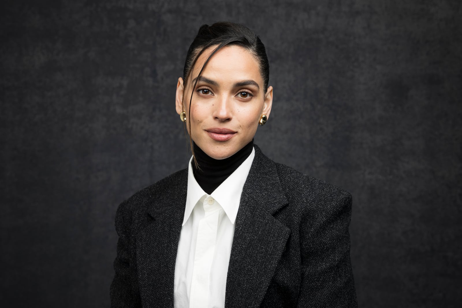 Adria Arjona poses for a portrait on Saturday, Nov. 16, 2024, in Los Angeles. Arjona has been named one of The Associated Press' Breakthrough Entertainers of 2024.(Photo by Willy Sanjuan/Invision/AP)