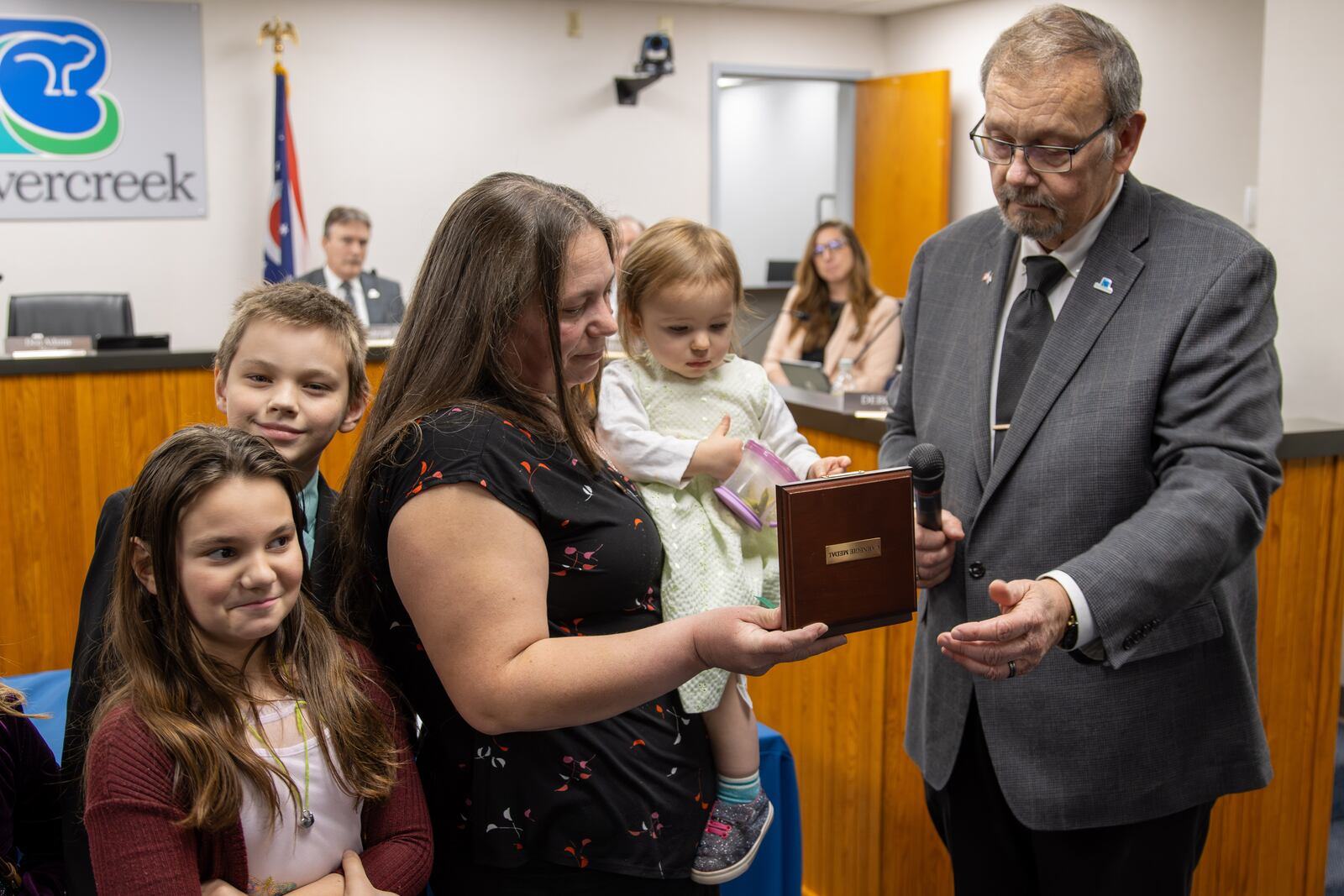 Laura Steele, partner of Anthony Diehl, and their children accept the Carnegie Medal for Heroism on behalf of their late husband and father, Anthony Diehl. CONTRIBUTED