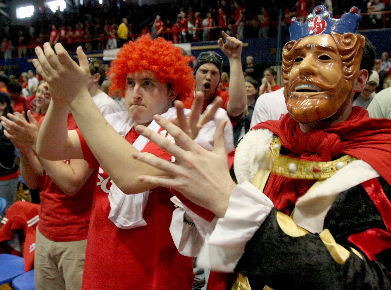 Jim Saywell, left, a UD student, and Paul Mykytka, a UD grad, react to the announcement Sunday, March 15, 2009 at the Frericks Center that UD will take on West Virginia in the first round of the NCAA tournament Friday in Minneapolis. Photo by E.L. Hubbard