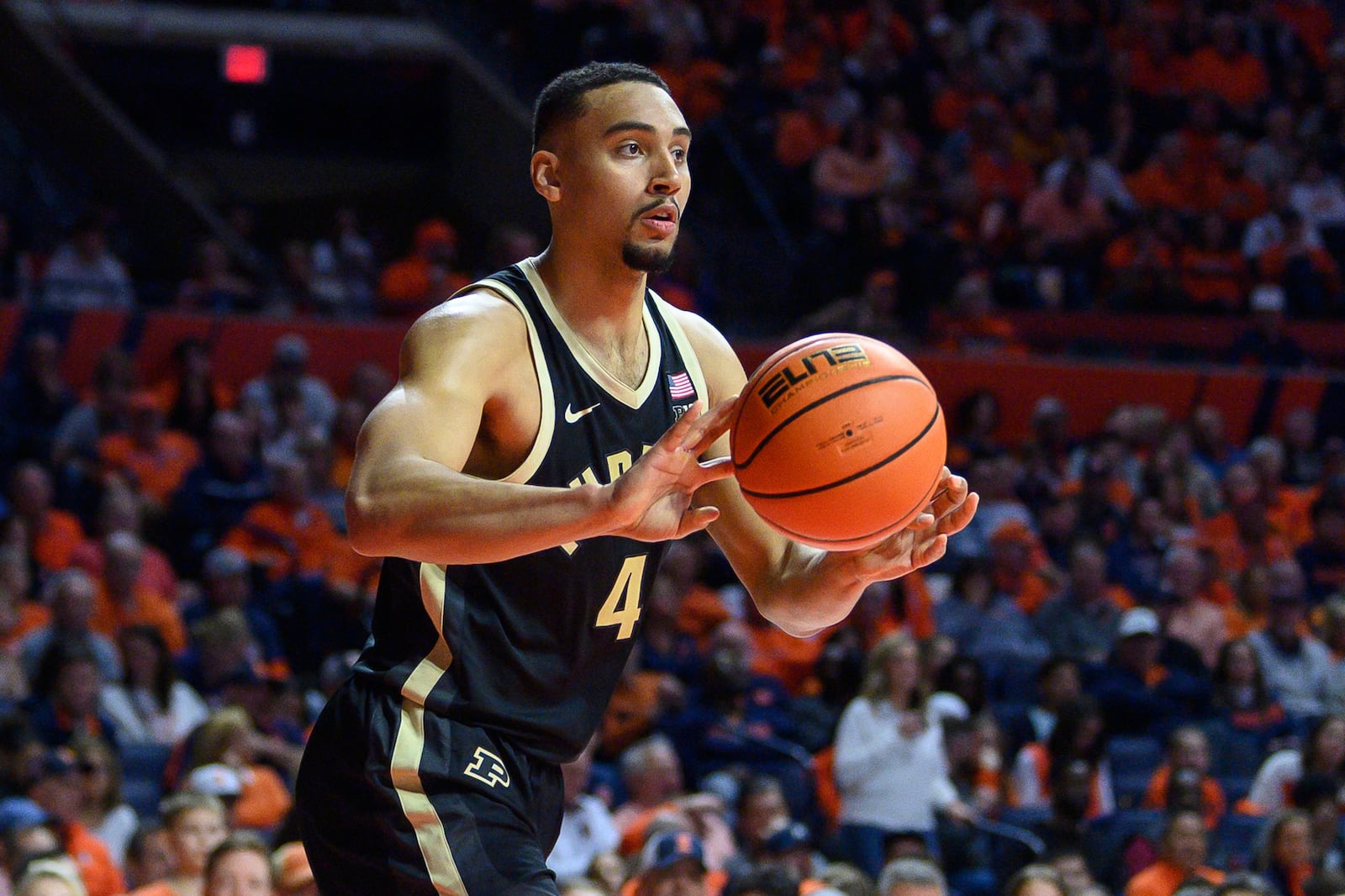 Purdue's Trey Kaufman-Renn passes during an NCAA college basketball game against Illinois, Friday, March 7, 2025, in Champaign, Ill. (AP Photo/Craig Pessman)