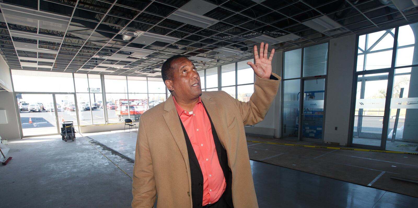 The tornado racked up millions of dollars of losses in inventory and facilities at Evans Arena Chrysler Dodge Jeep Ram. Ed Bressler, the general manager, gives a tour of the showroom as it’s rebuilt. CHRIS STEWART / STAFF