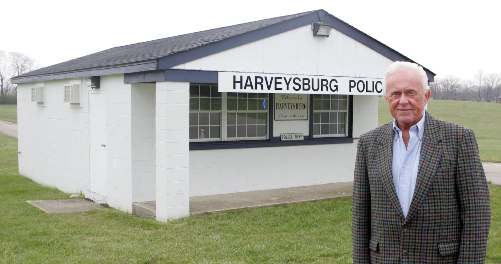 Peter Carroll, founder of the Ohio Renaissance Festival.
In 2007, Carroll allowed the local police department to move into a building on the festival property. The department later moved back into the village.


 April 07 Photo by Ron Alvey. Peter Carroll stands in front of a building that is soon to house the Harveysburg Police Department. The building sits at the entrance to the Rennaissance Festive site.  FOR A LARRY BUD STORY.