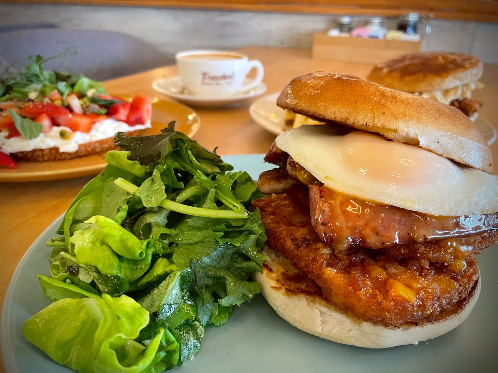 Toasted Brunch Bar + Cafe, a new restaurant concept specializing in traditional American and internationally fused breakfast, lunch and dinner options, is opening Friday, Nov. 8 just outside of the Mall at Fairfield Commons in Beavercreek. Pictured is the Loaded Bagel Sandwich. NATALIE JONES/STAFF