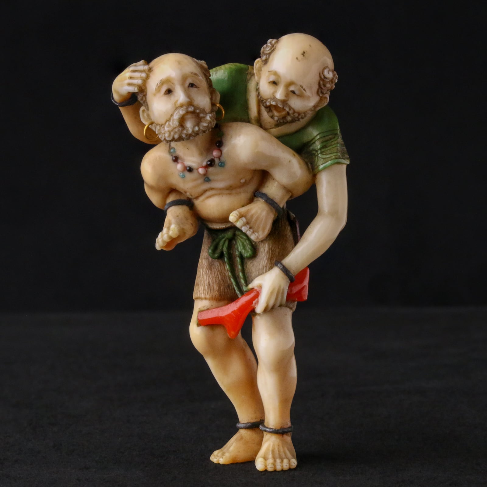 Netsuke in the shape of the mythical figures Ashinaga and Tenaga. CONTRIBUTED