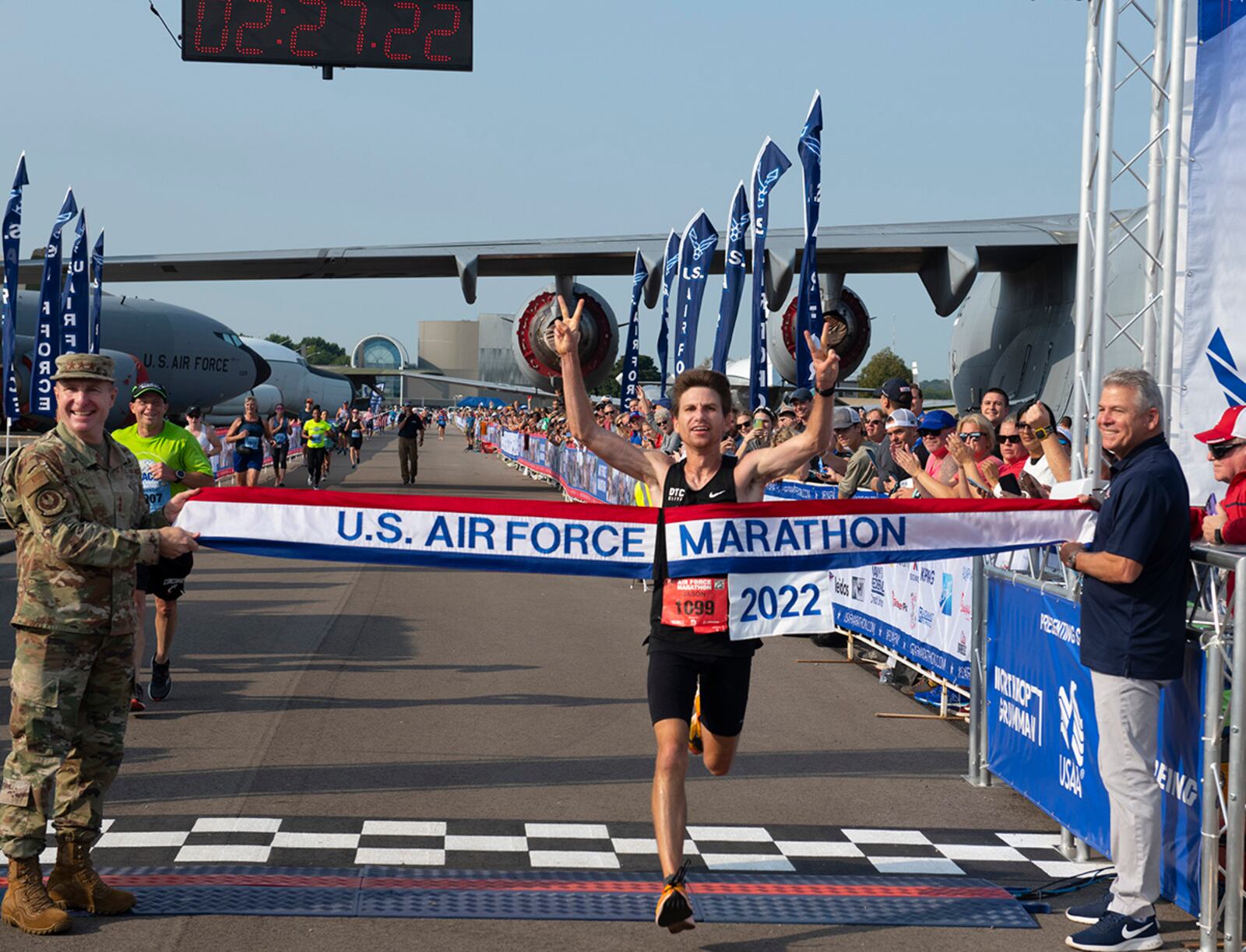 Jason Salyer of Tipp City, this year's Air Force Marathon champion, crosses the finish line Sept. 17 with a time of 2 hours, 27 minutes, 23 seconds. The full marathon was among several races during the 26th annual Air Force Marathon at Wright-Patterson Air Force Base. U.S. AIR FORCE PHOTO/R.J. ORIEZ