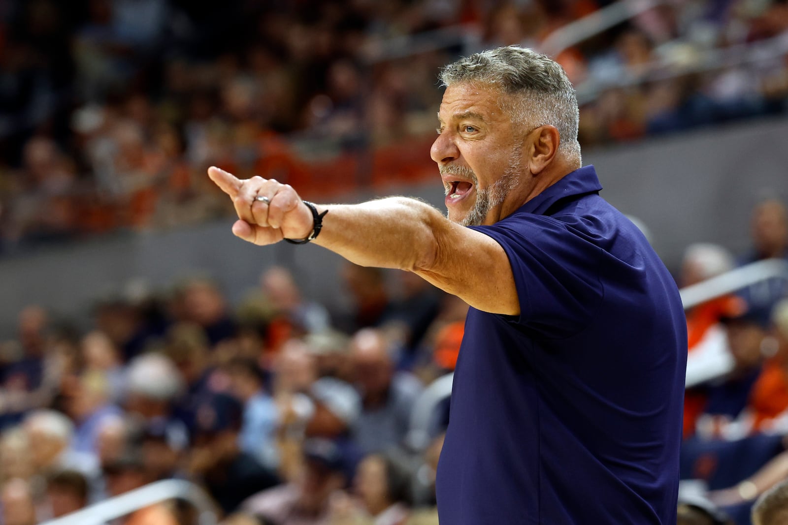 Auburn head coach Bruce Pearl signals to players during the first half of an NCAA college basketball game against Vermont, Wednesday, Nov. 6, 2024, in Auburn, Ala. (AP Photo/ Butch Dill)