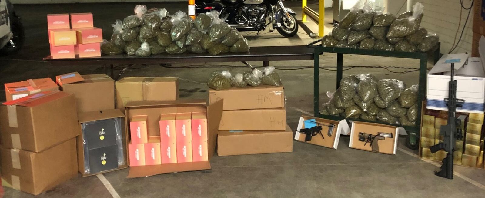 Police seized more than 70 pounds of suspected marijuana; 10 pounds of hash oil/wax; 8,000 THC cartridges for vaping devices; four guns; and electronic devices and documentation during the six simultaneous May 26, 2022, raids conducted by the Tactical Crime Suppression Unit along with the Warren County Drug Task Force in Dayton, Kettering, Miamisburg and West Carrollton. CONTRIBUTED