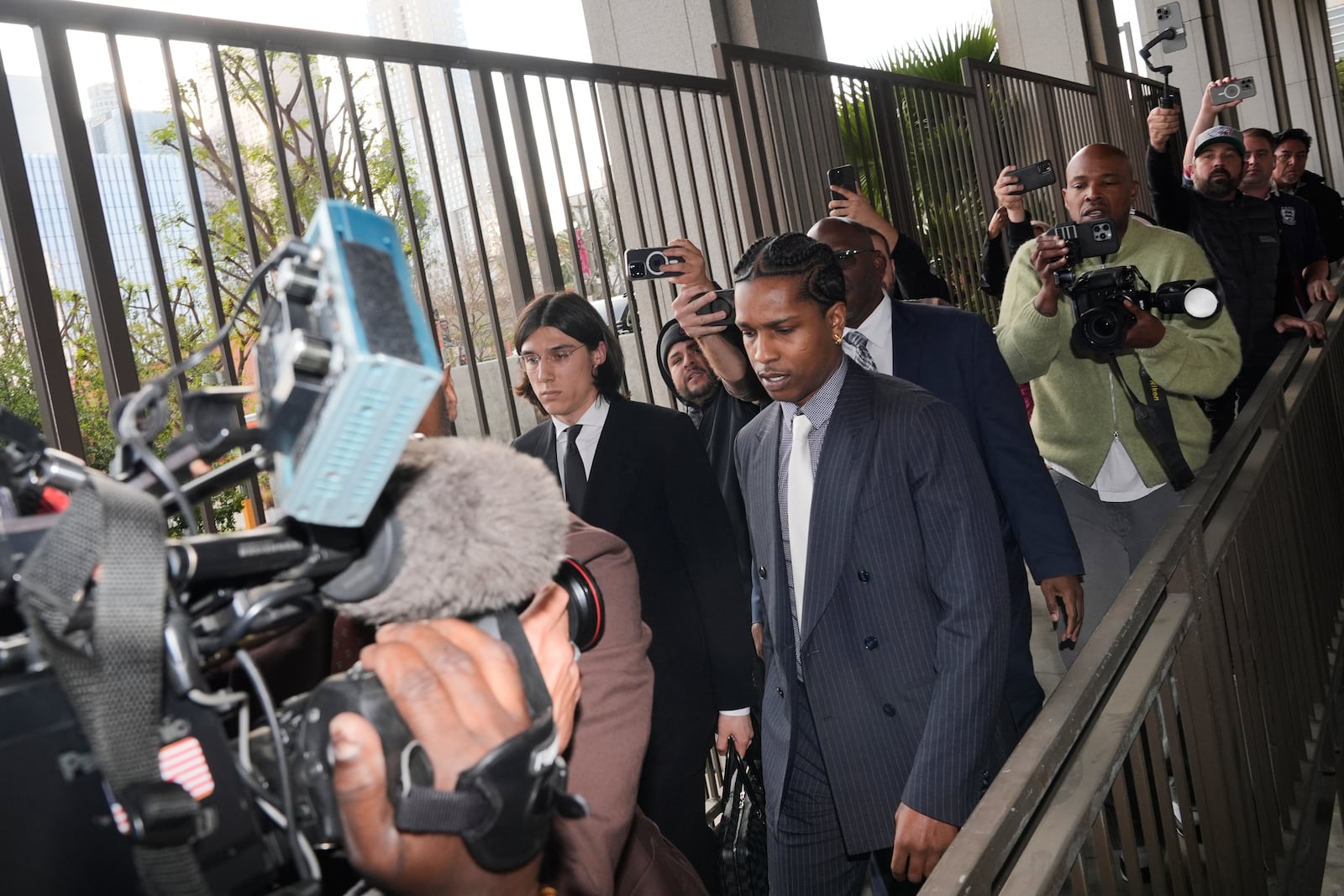 A$AP Rocky arrives at court for his trial Tuesday, Feb. 18, 2025, in Los Angeles. (AP Photo/Damian Dovarganes)