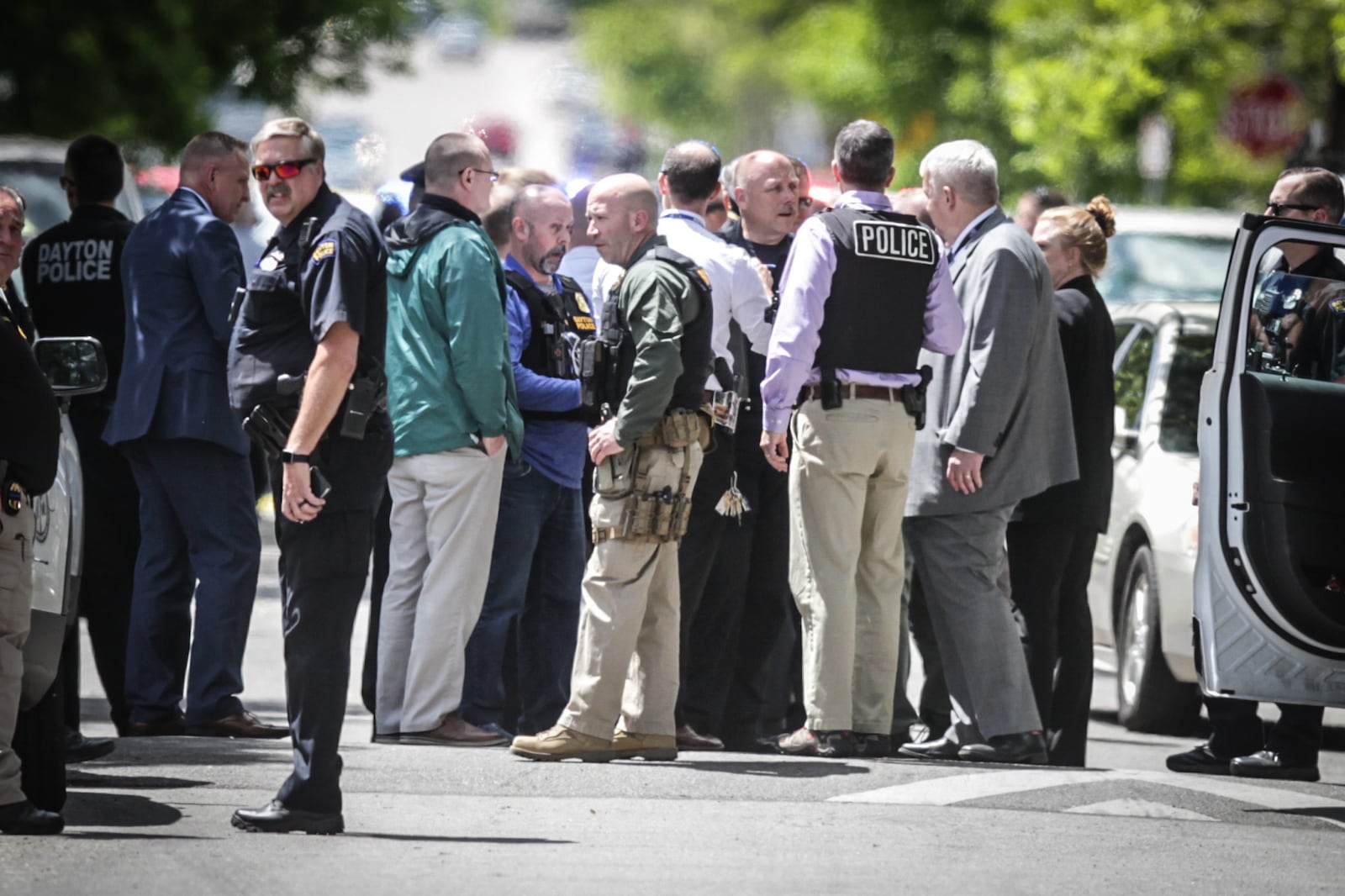 Multiple police agencies responded to Lexington Avenue on Wednesday, May 12, 2021, after a call for officer assistance was issued and shots fired was reported. JIM NOELKER / STAFF