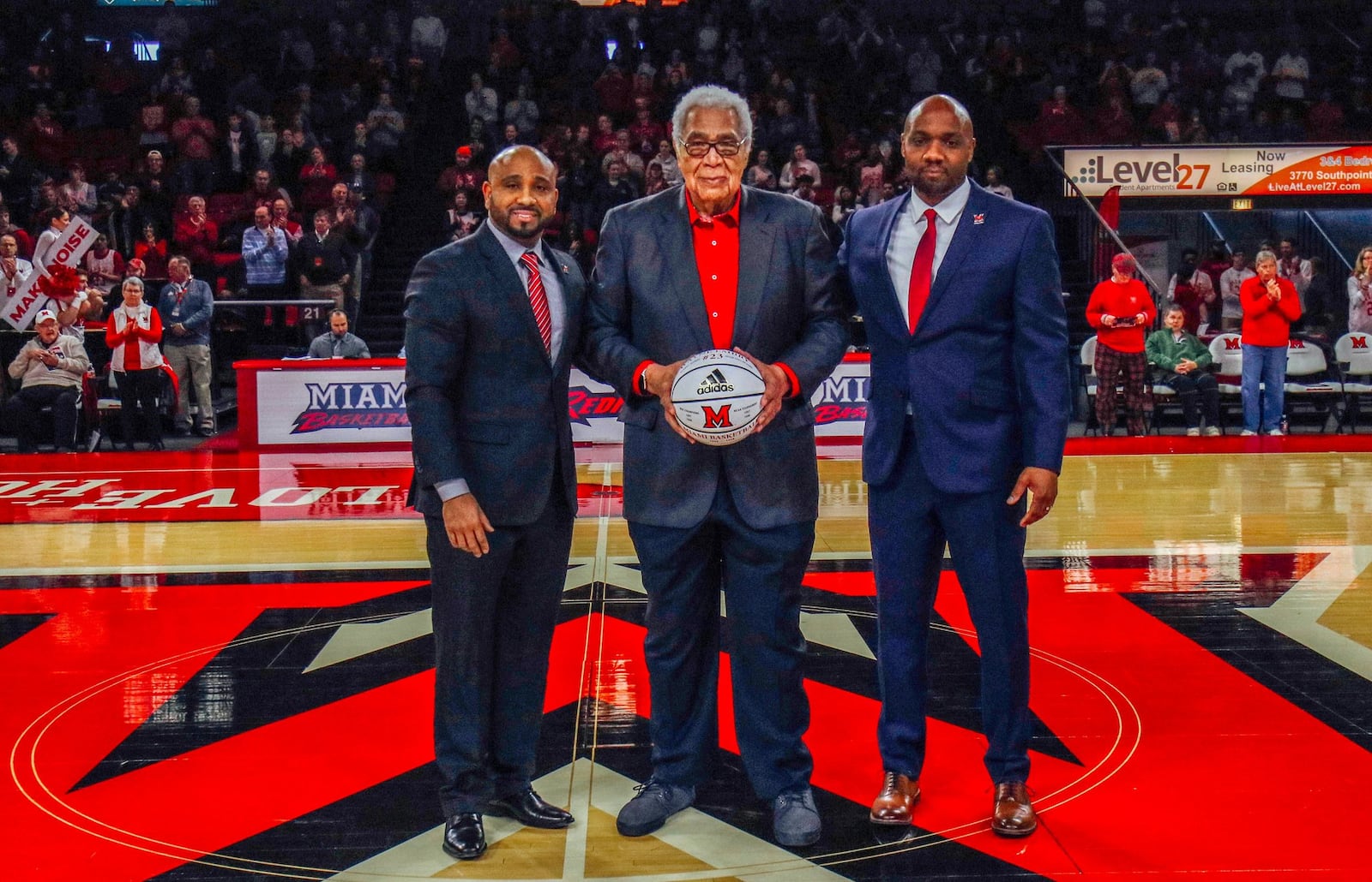 Wayne Embry is presented with a basketball on Wayne Embry Day on Saturday at Millett Hall in Oxford. Embry, a 1958 Miami grad, ranks 12th all-time on Miami’s scoring list and second in rebounds. Embry is in the Miami Hall of Fame and the College Basketball Hall of Fame. After a successful NBA career, he became the first African-American general manager in NBA history. He was elected to the Naismith Hall of Fame in 1999 for his on and off the court accomplishments. Embry (center) is pictured with Miami head coach Jack Owens (left) and Miami assistant Damon Frierson. CONTRIBUTED