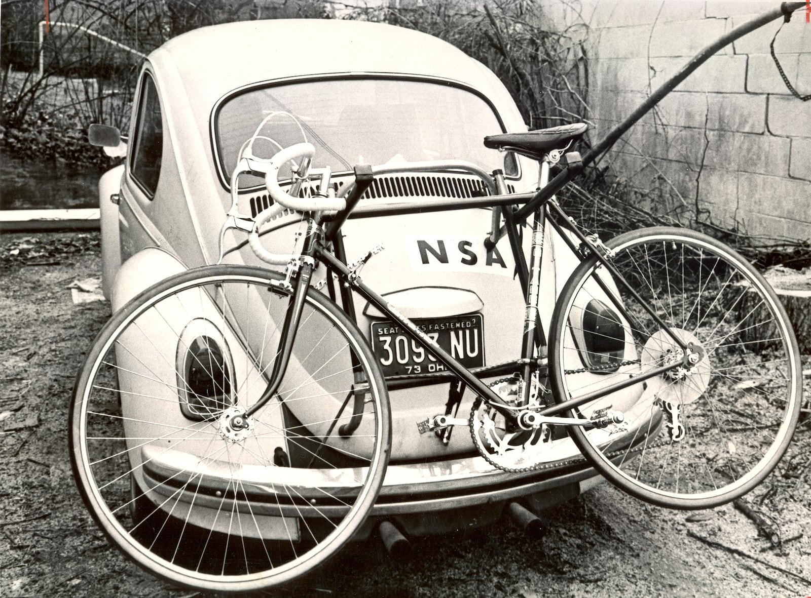 The caption for this Dayton Daily News photograph taken on Ravenwood Drive in Dayton in Feb. 1974 reads, "Maybe this is the solution to the gas shortage. An economy car and a bicycle strapped to the back in case you do run out of fuel." DAYTON DAILY NEWS ARCHIVE