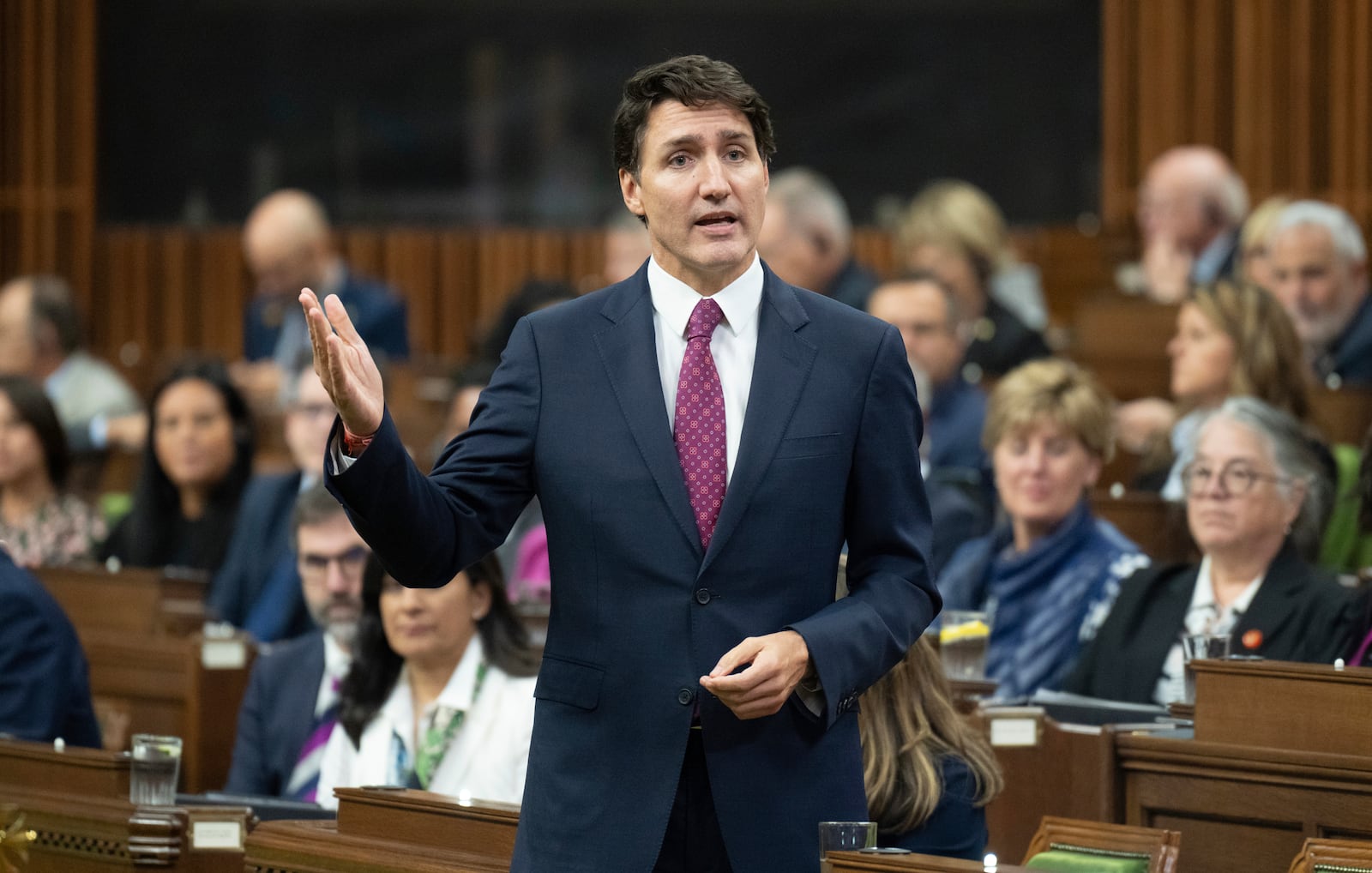 Canada Prime Minister Justin Trudeau rises during Question Period in Ottawa, Tuesday, Oct. 22, 2024. (Adrian Wyld/The Canadian Press via AP)