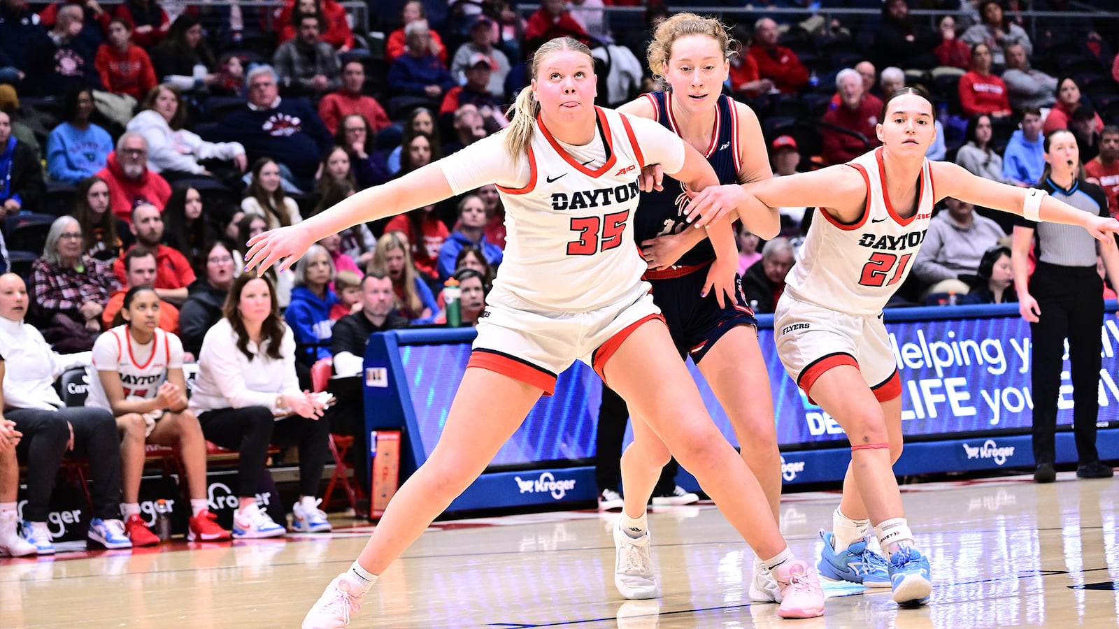 Dayton's Molly O'Riordan (35) boxes out a Richmond player during Sunday's game at UD Arena. Erik Schelkun/University of Dayton Athletics photo