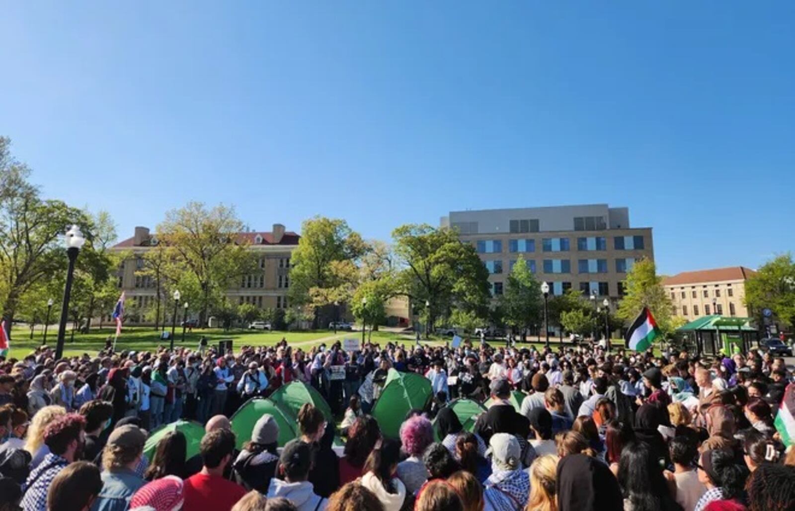 Ohio State University on Thursday became the latest site of student protests against Israel as hundreds of Ohio State University students, faculty and members of the Ohio Arab community rallied and set up tents outside the student union. Cole Behrens/Columbus Dispatch