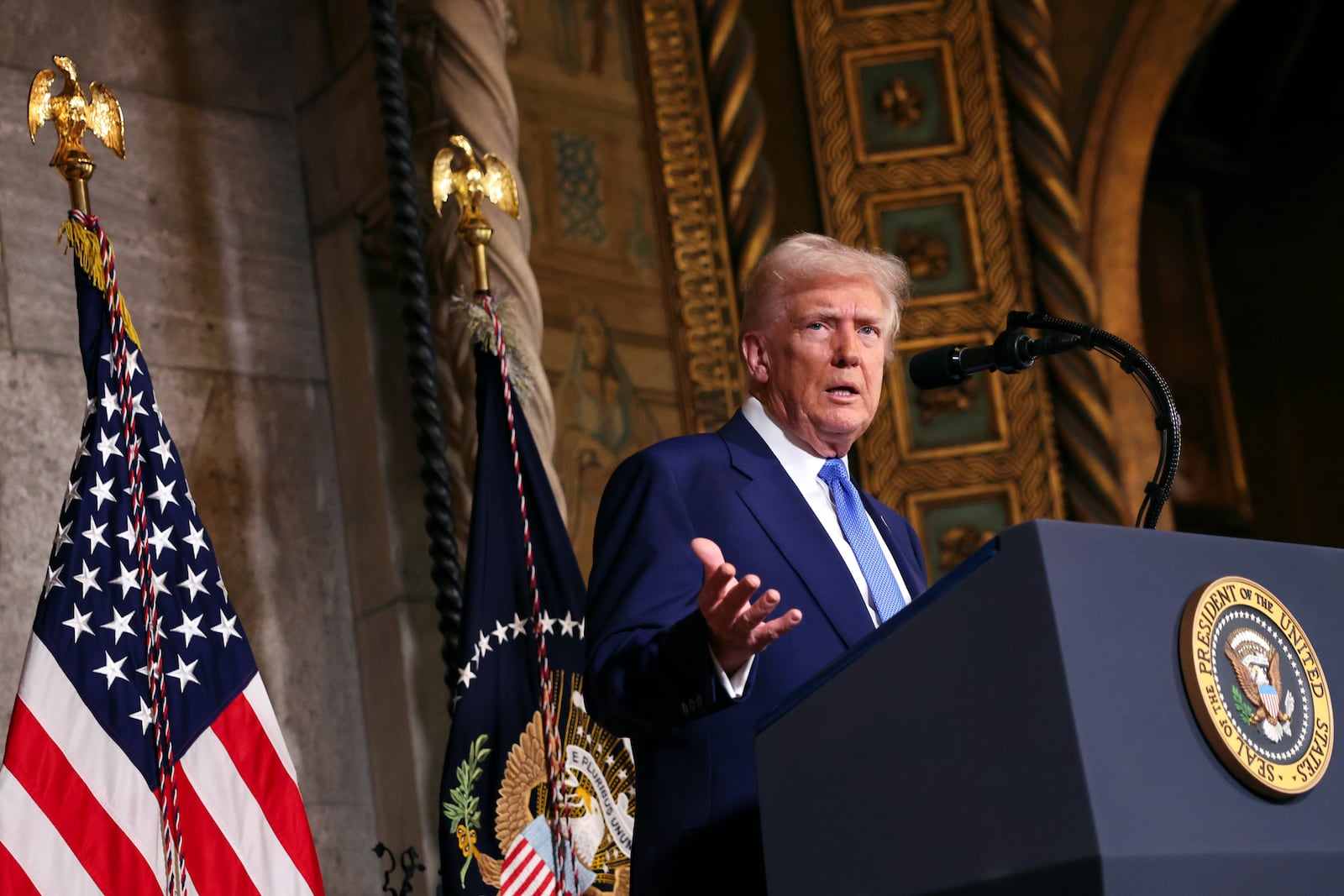 President Donald Trump speaks at Mar-a-Lago in Palm Beach, Fla., Tuesday, Feb. 18, 2025. (Pool via AP)